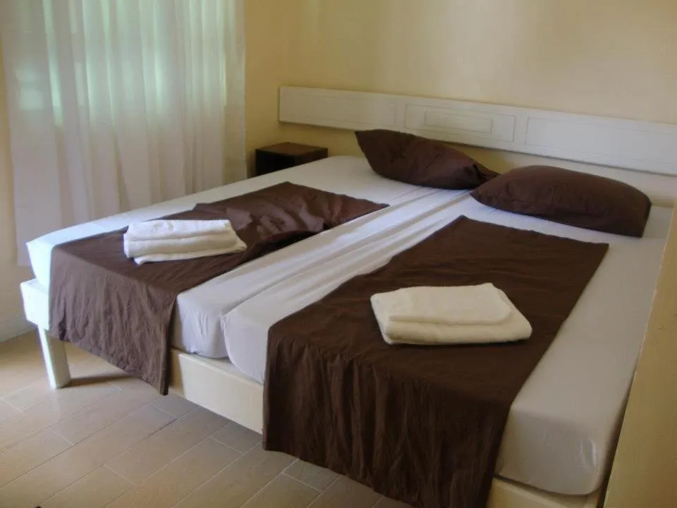 Bed in Joaquinn's Bed and Breakfast