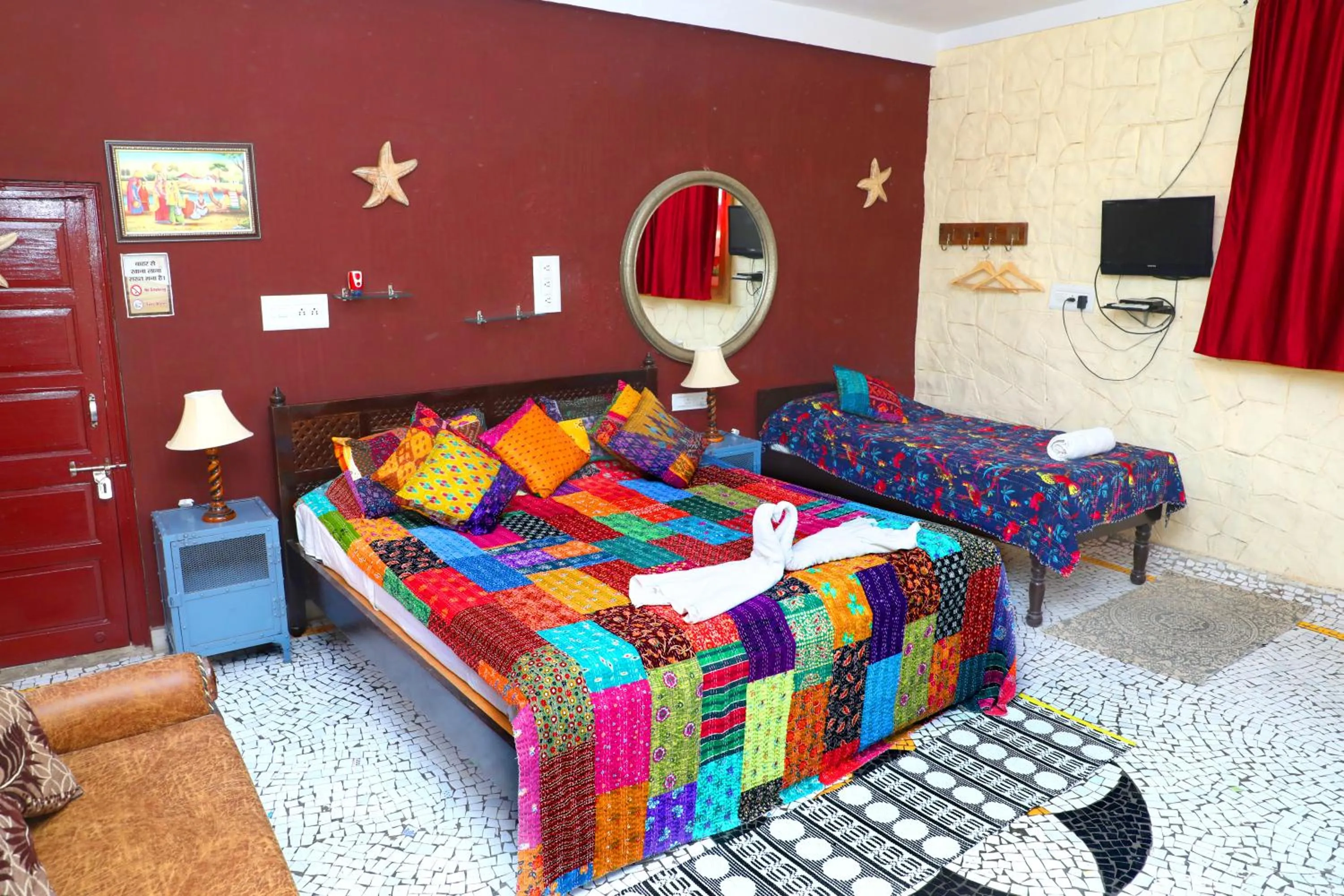 Photo of the whole room, Bed in Jodhpur Heritage Haveli Guest House