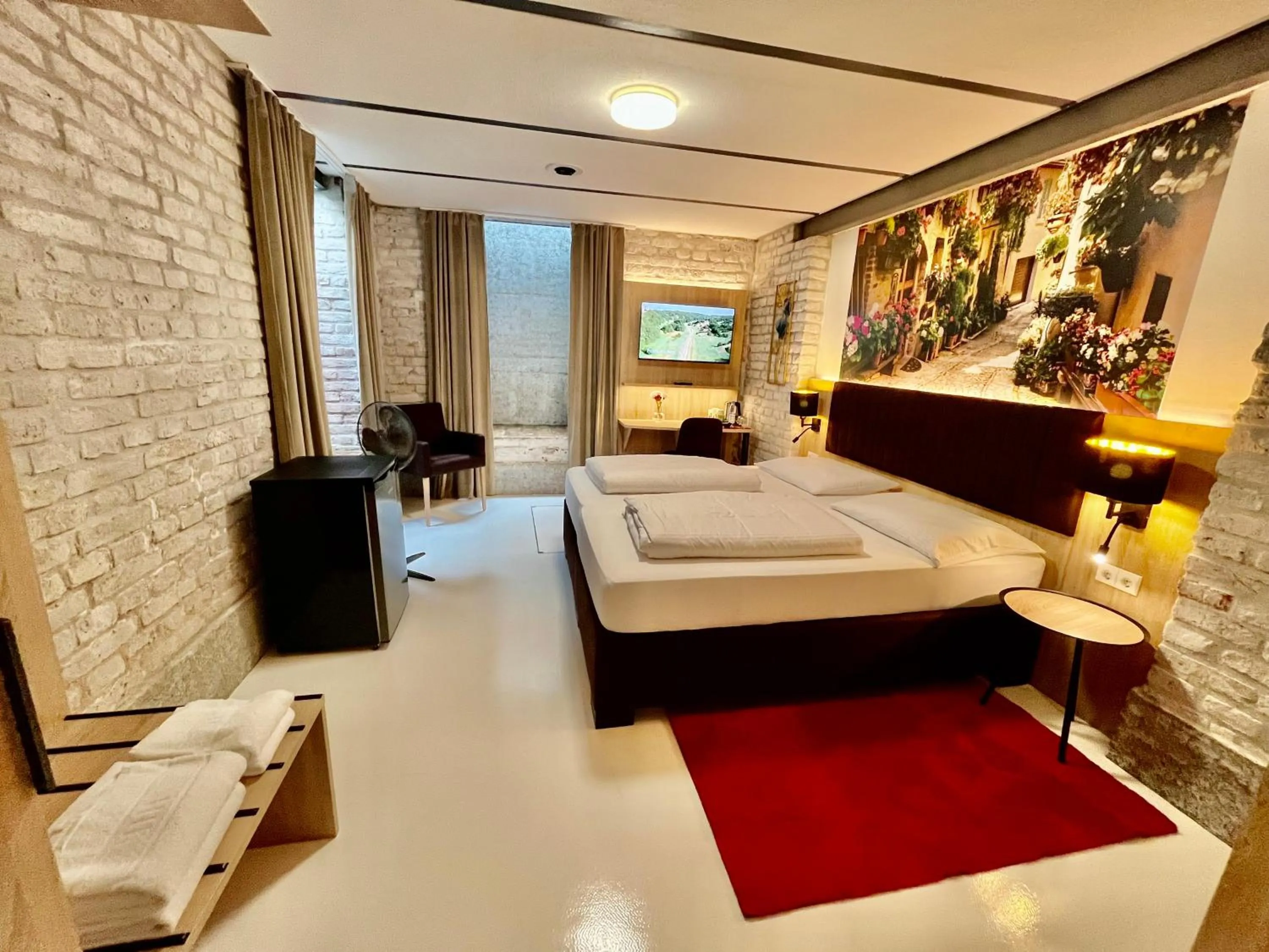 Bed in Adlzreiter City Pension