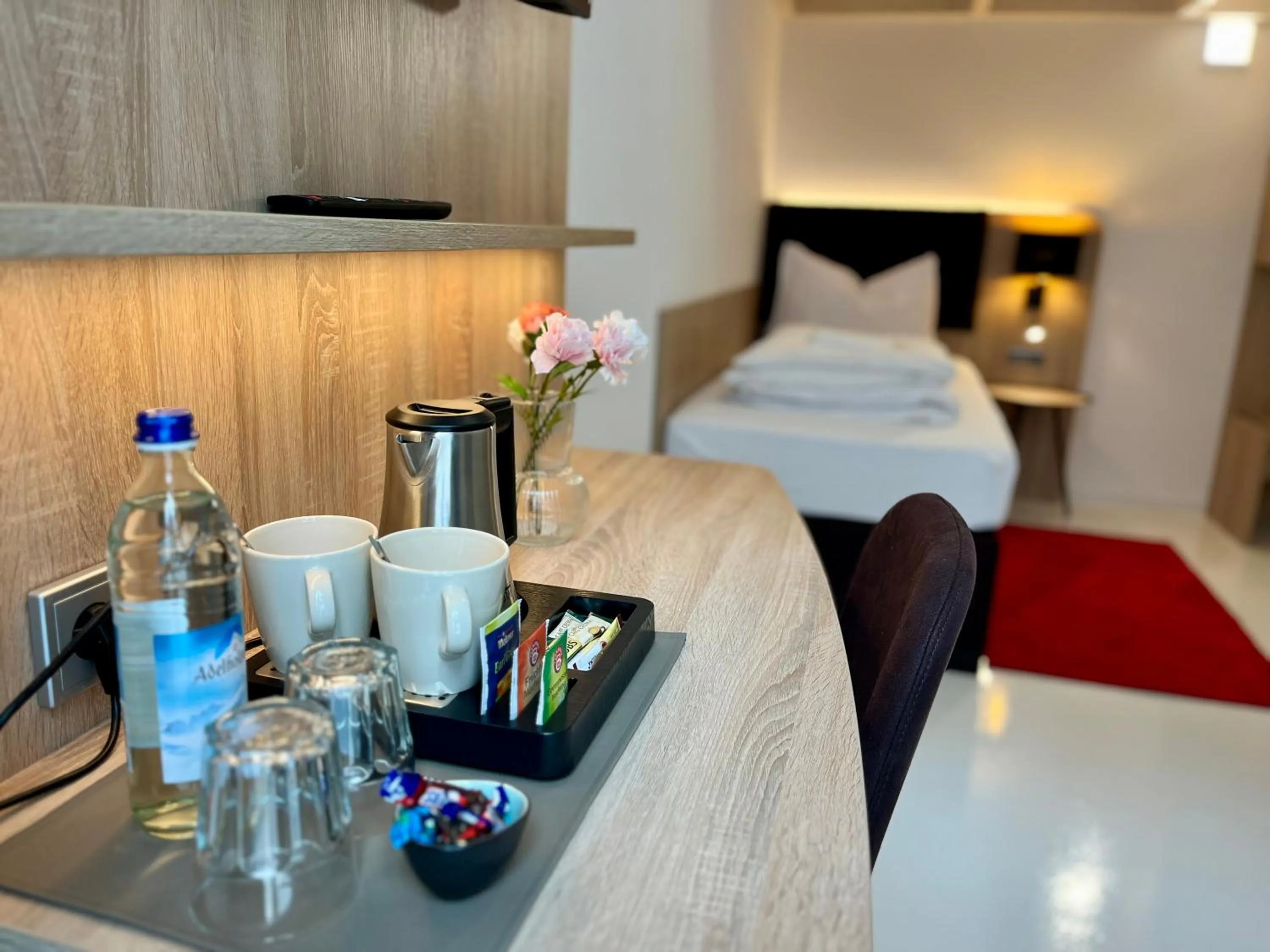 Bed in Adlzreiter City Pension