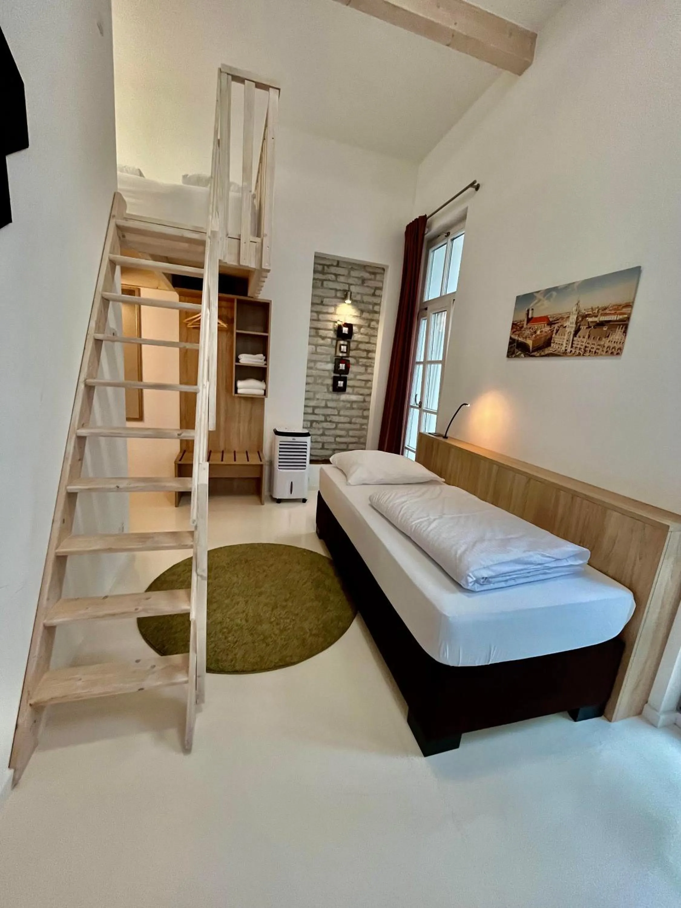 Bed in Adlzreiter City Pension