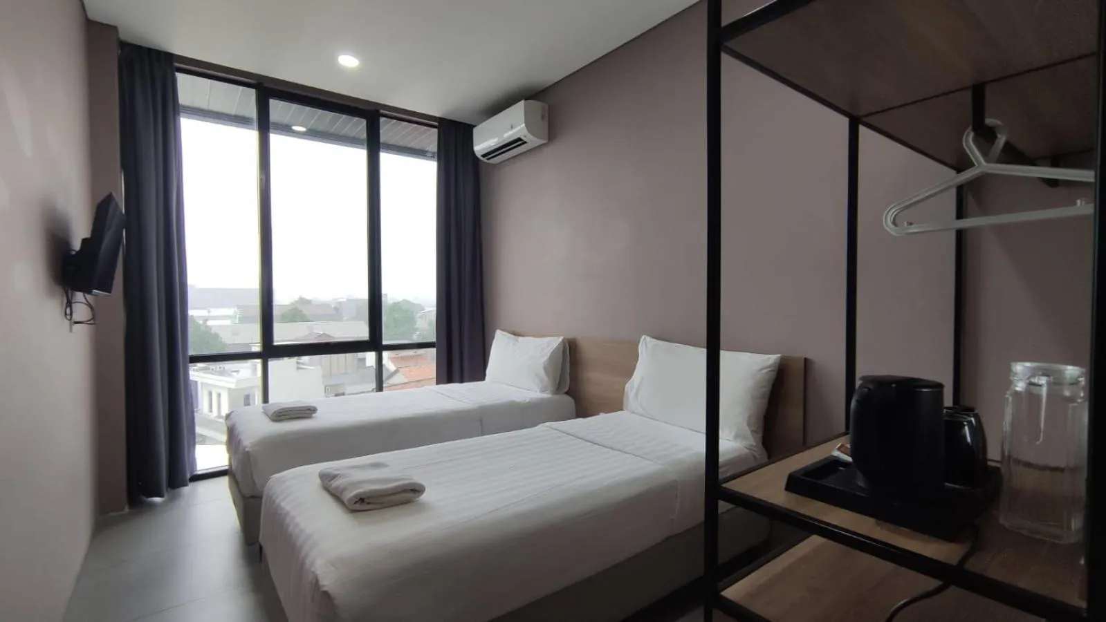 Bed in VNC Alam Sutera Hotel Powered by Archipelago