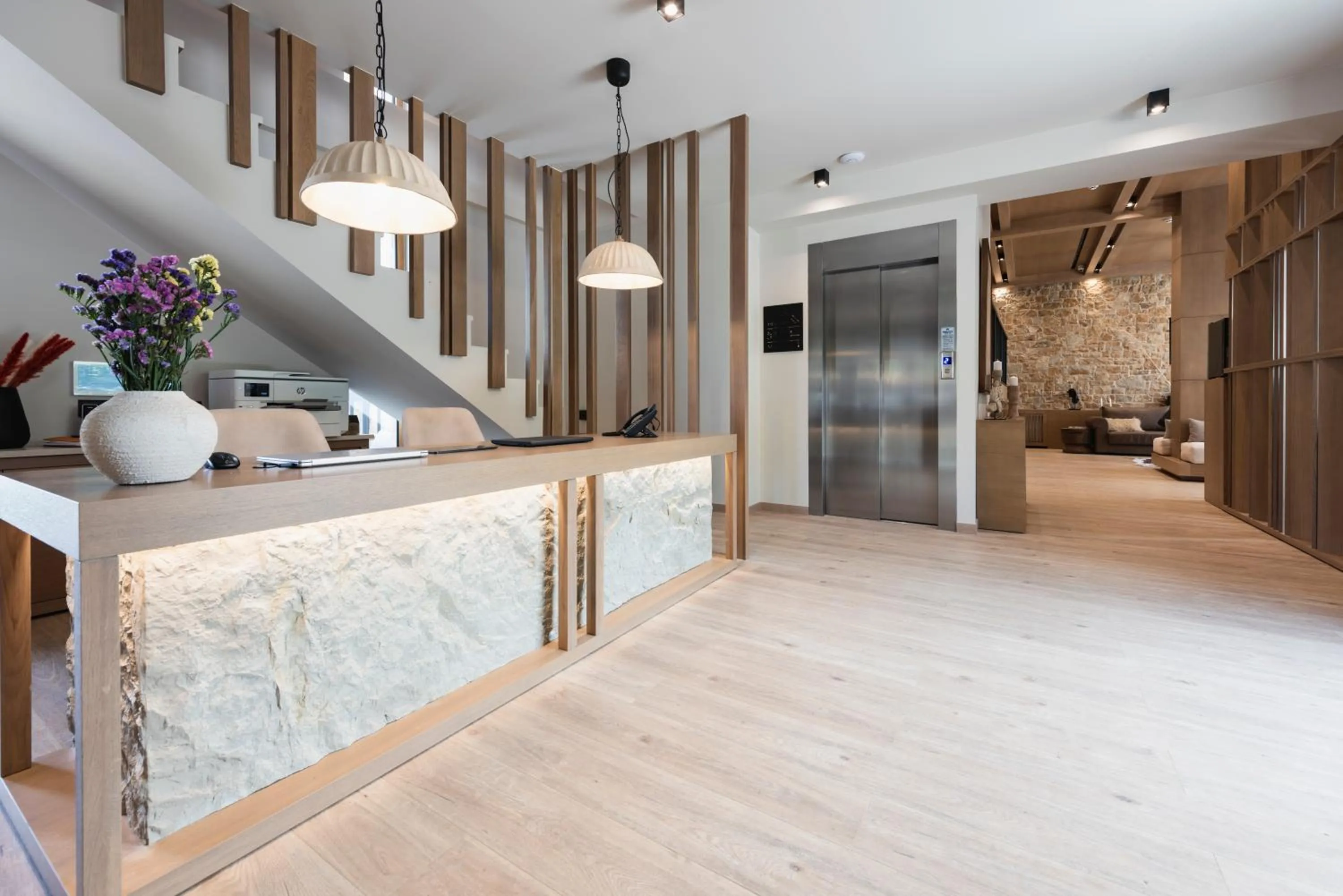 Lobby or reception in Revi Mountain Resort Boutique Hotel