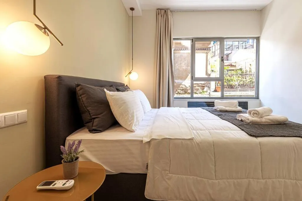 Bed in Smart Apartments