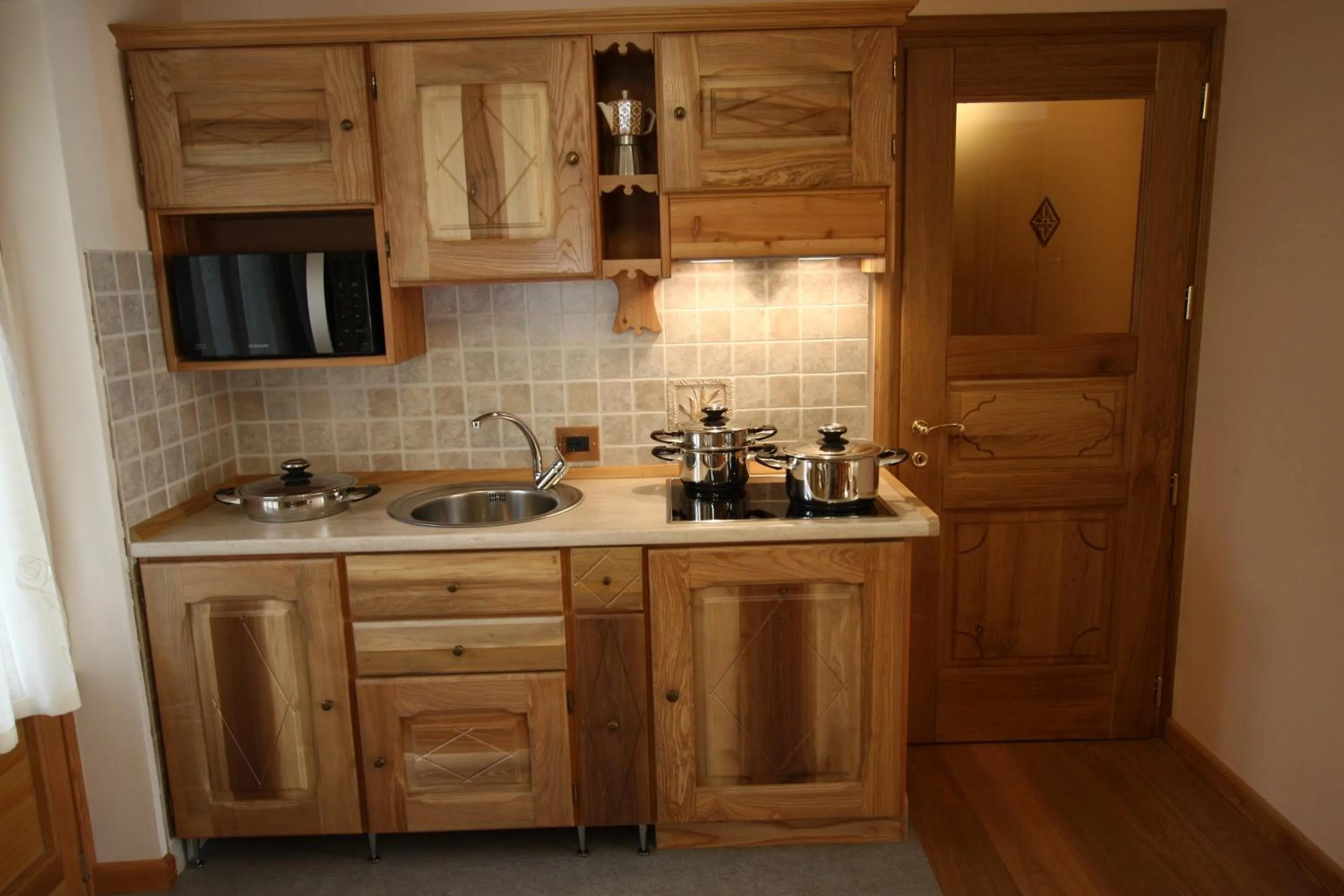 Kitchen or kitchenette in Villa Giuditta Residence