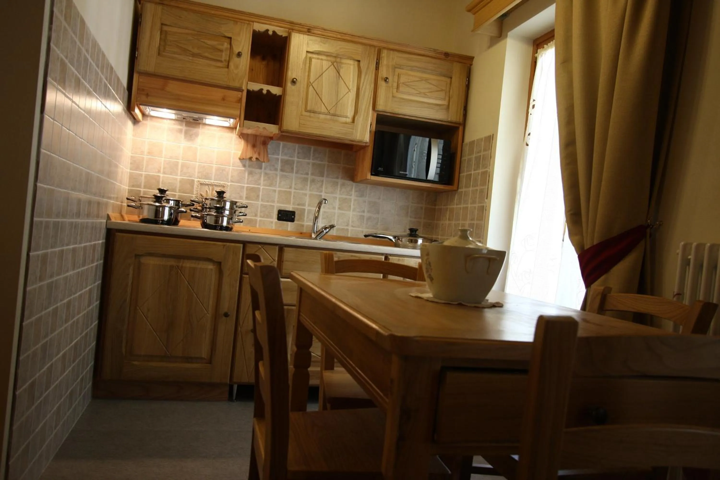 Kitchen or kitchenette in Villa Giuditta Residence