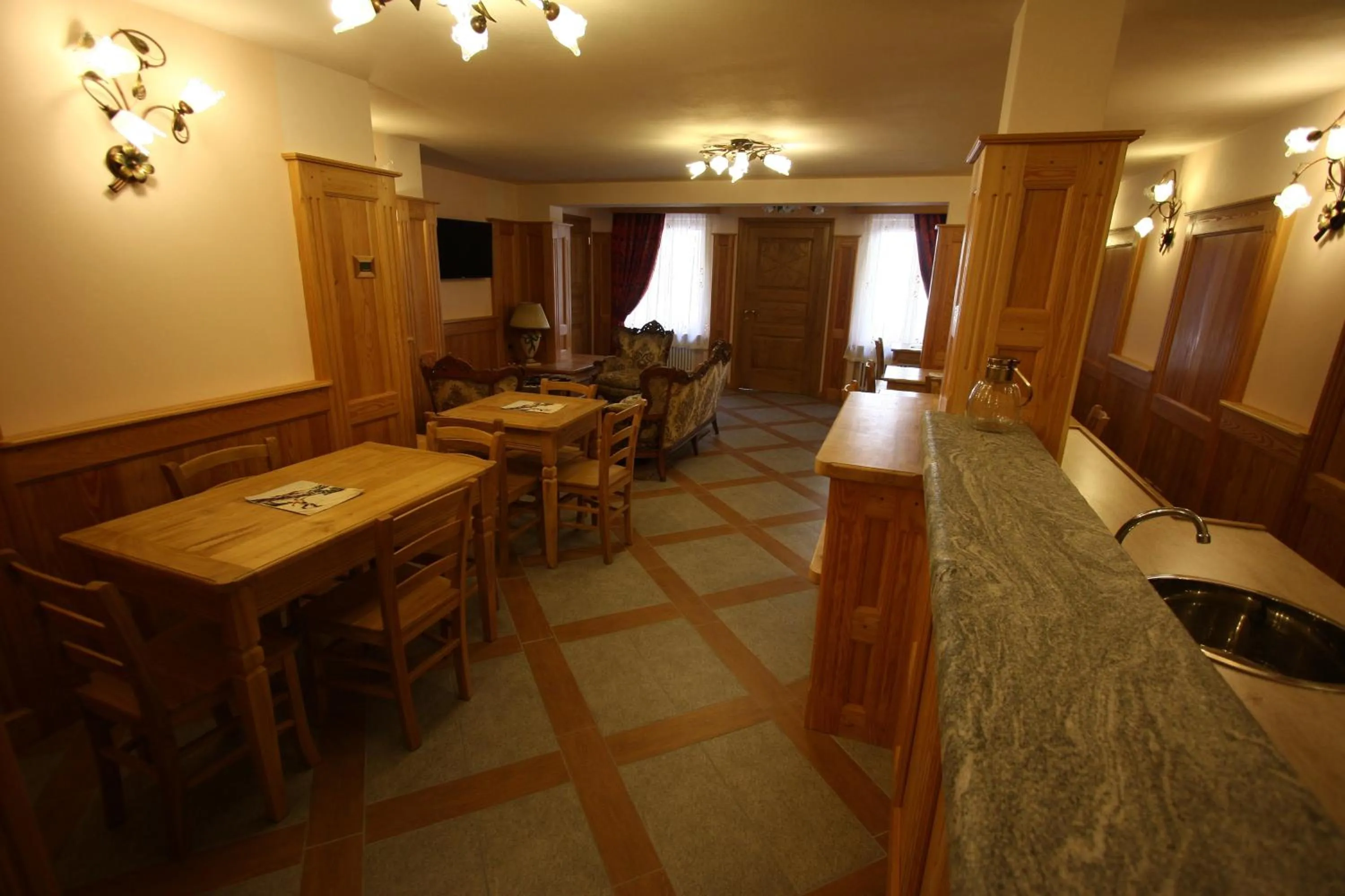 Communal lounge/ TV room in Villa Giuditta Residence