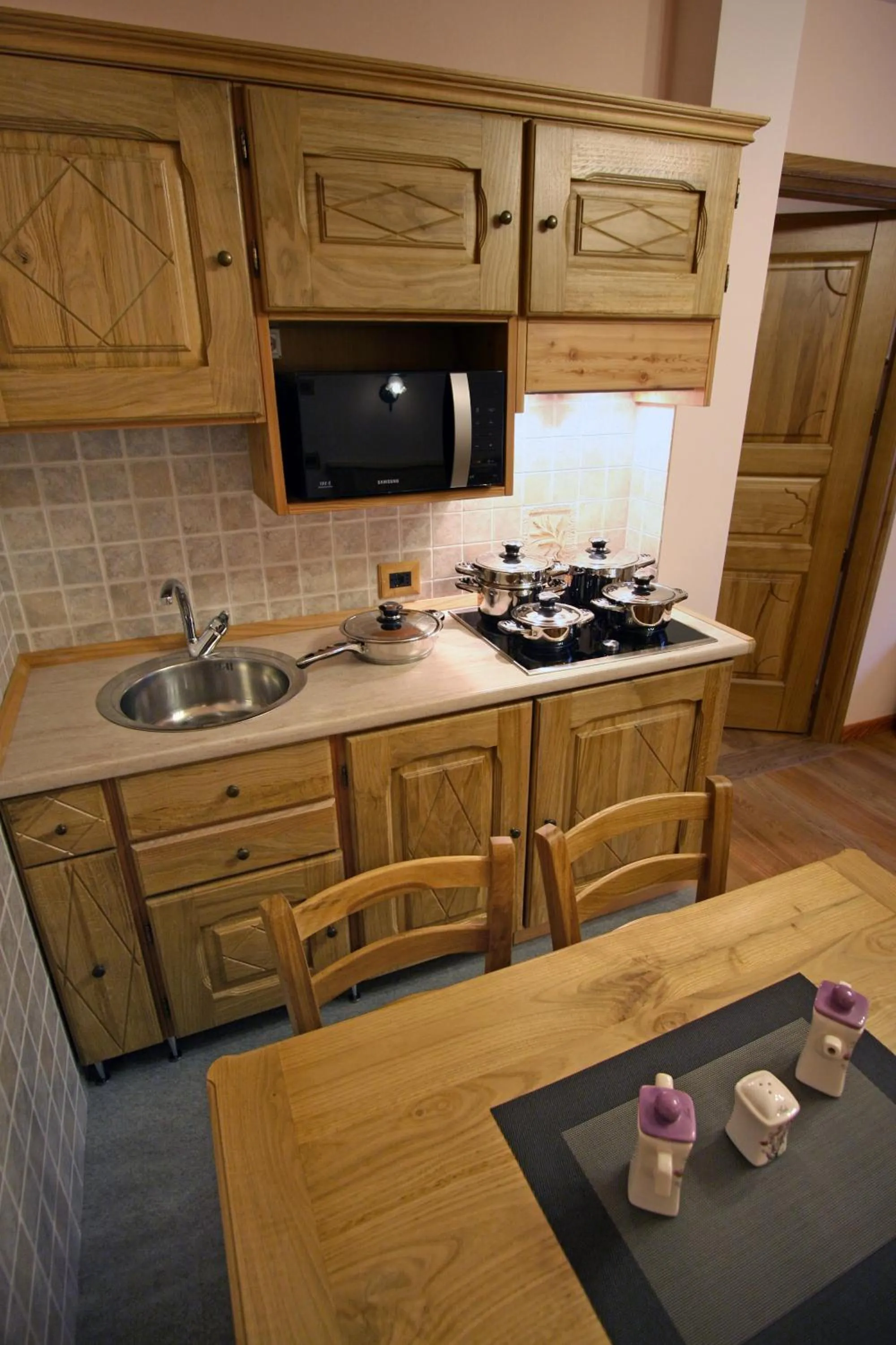 Kitchen or kitchenette in Villa Giuditta Residence