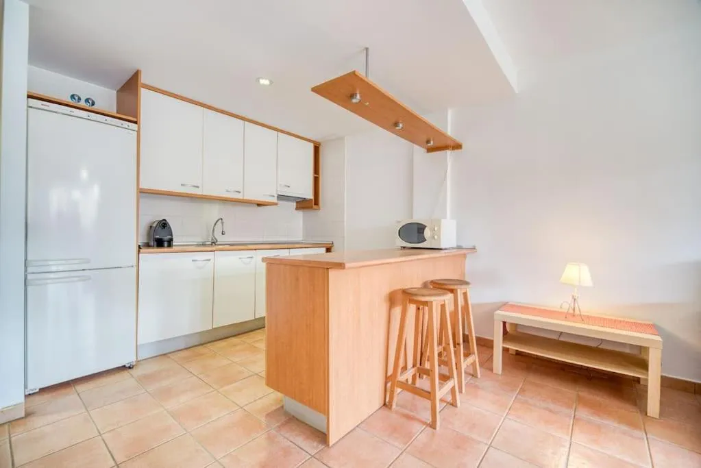 Kitchen or kitchenette in Piso para vacaciones familiares