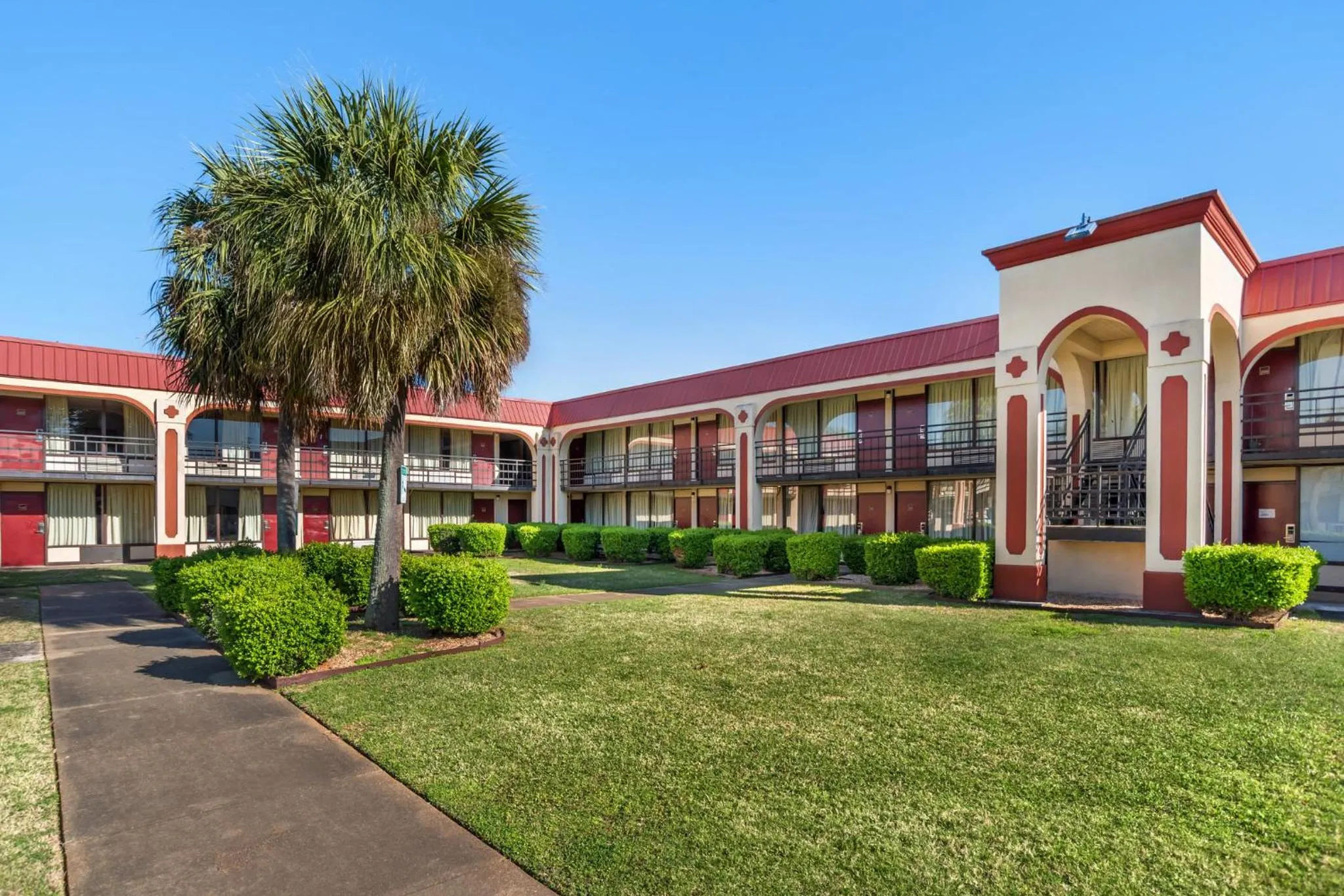 Property building in HomeTowne Studios by Red Roof Montgomery - Midtown