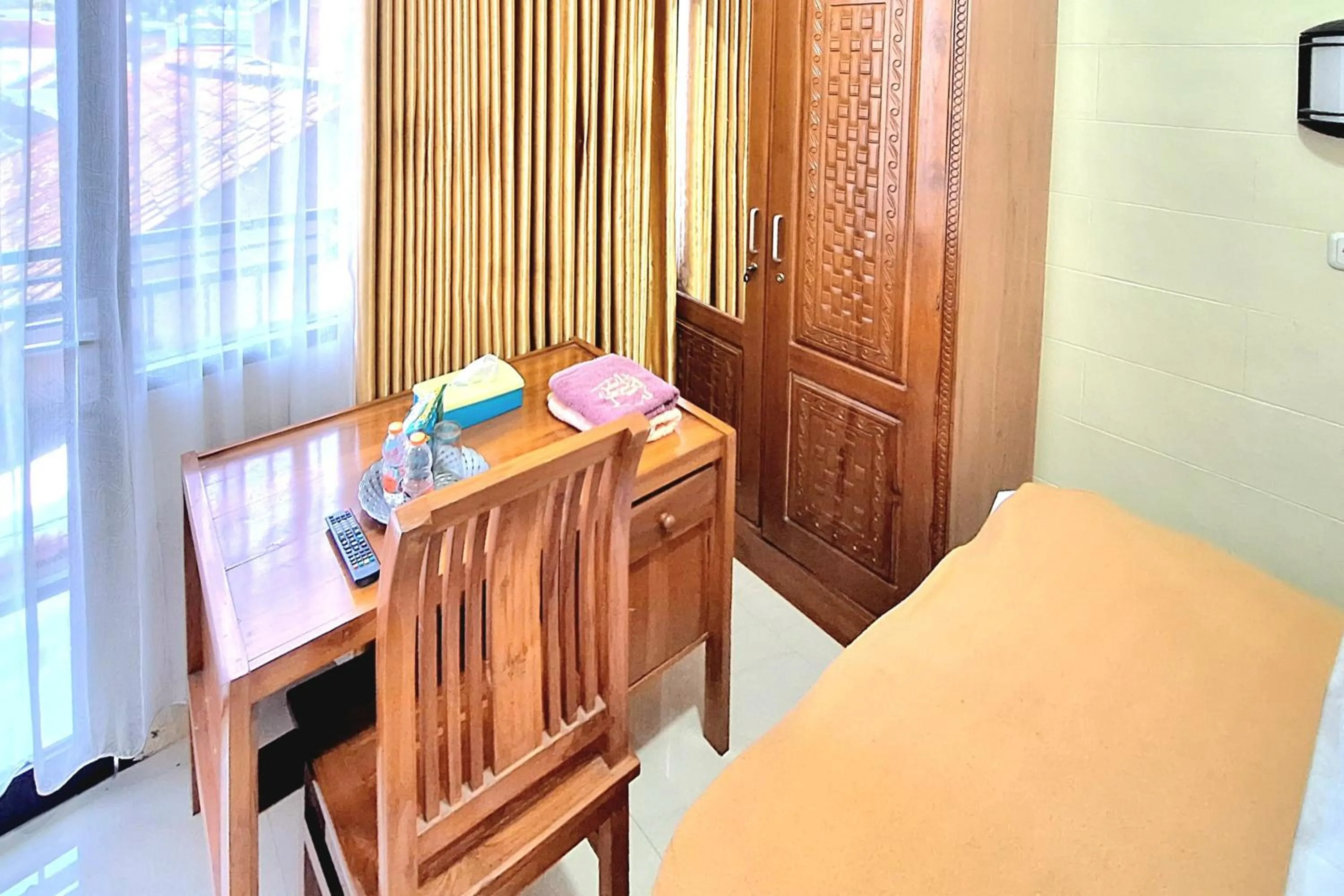 Bedroom in Griya Pradipa Syariah Near Balai Kota Batu Mitra RedDoorz