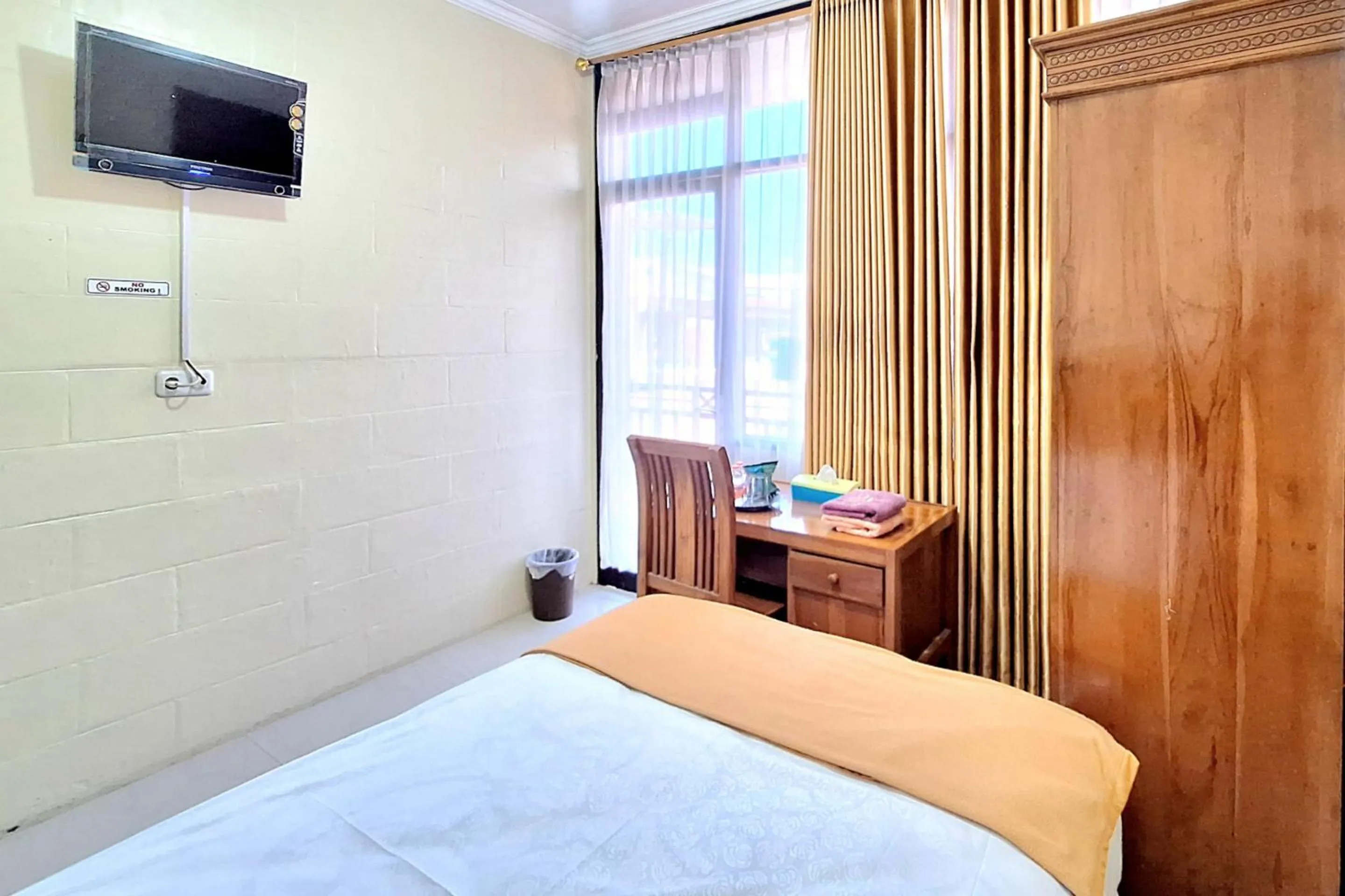 Bedroom in Griya Pradipa Syariah Near Balai Kota Batu Mitra RedDoorz