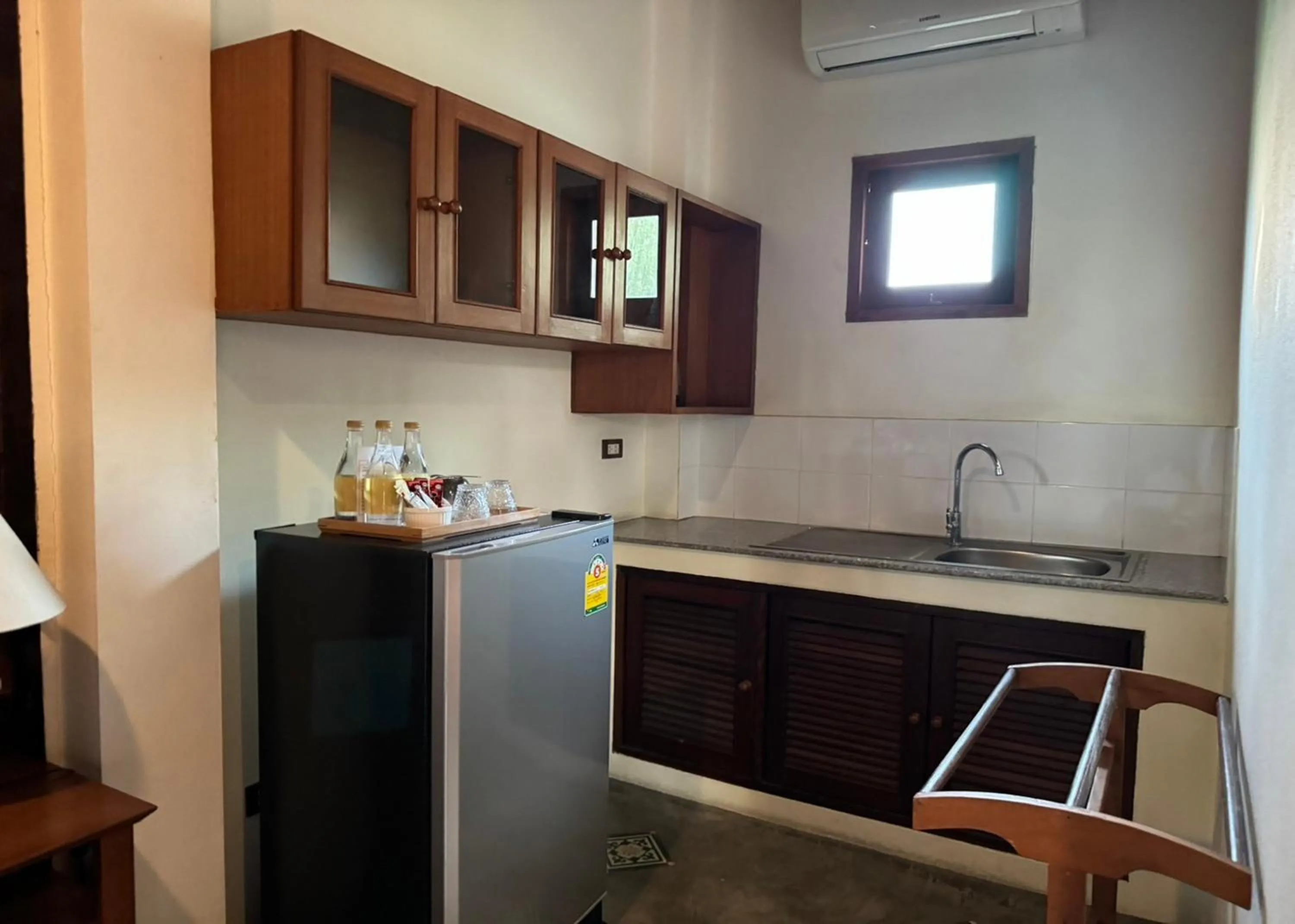 Kitchen or kitchenette in Karina Resort Chiang Mai