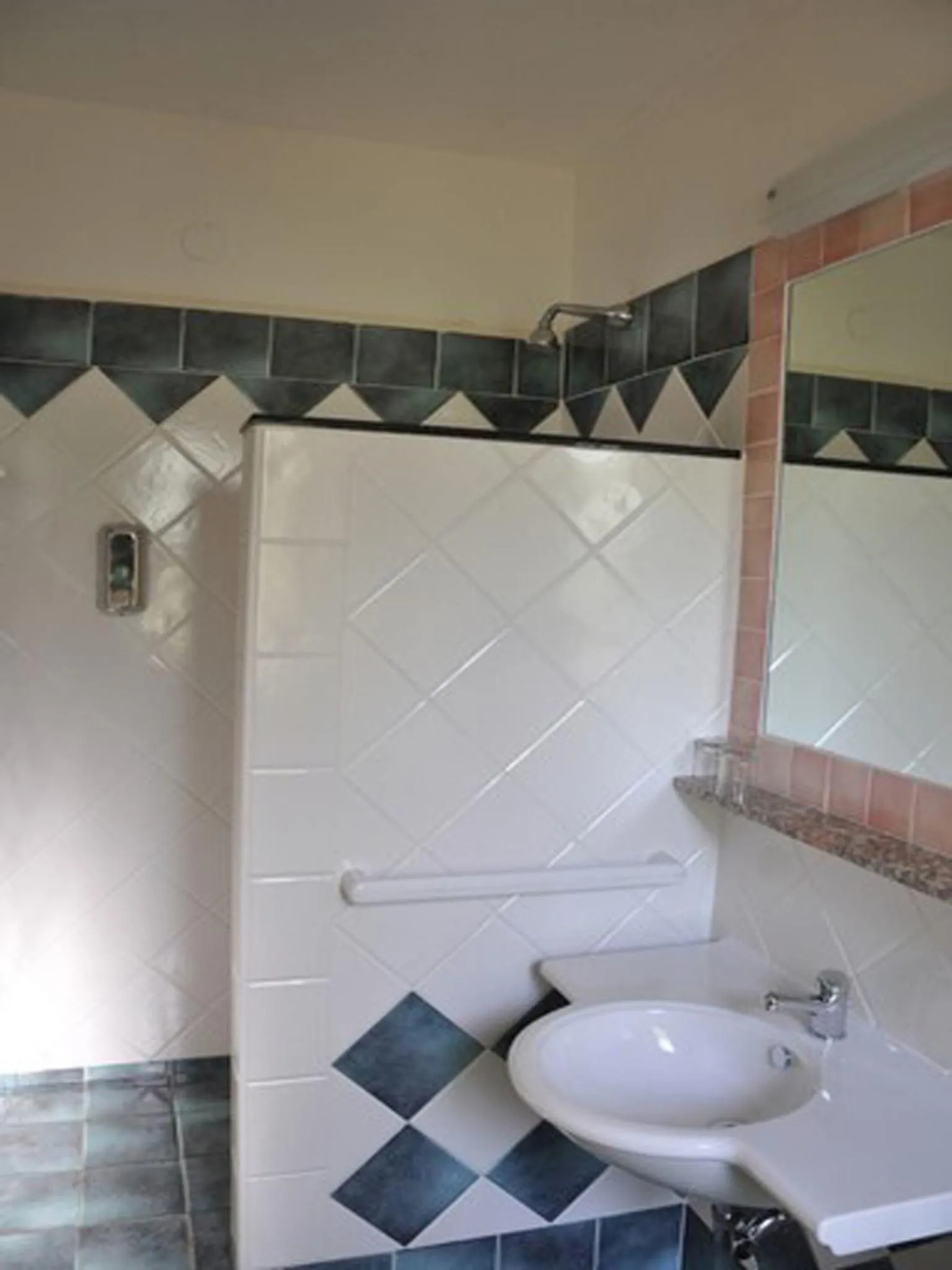 Bathroom in Hotel L'Oasi