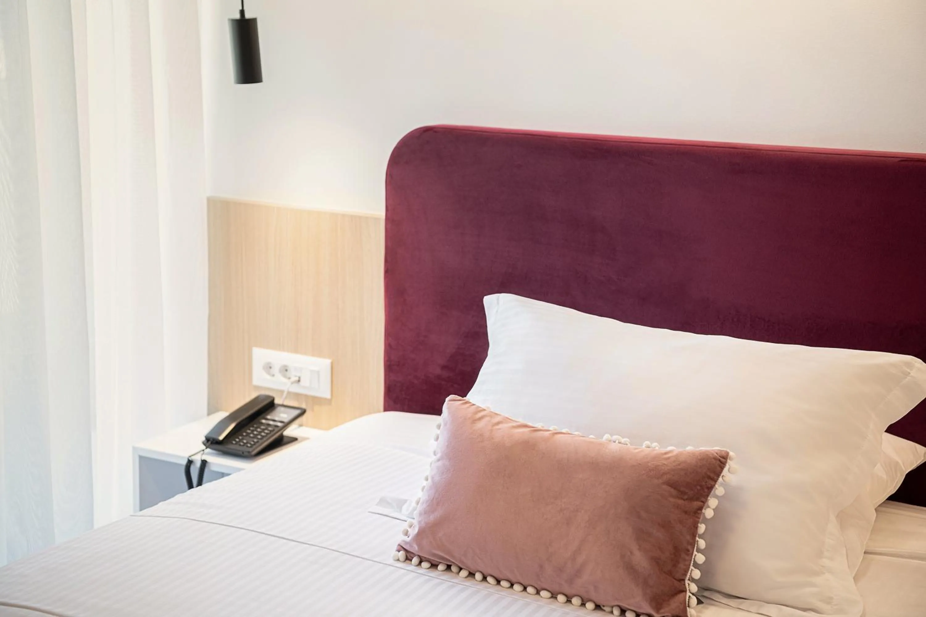 Bed in Miss Marrone City Hotel