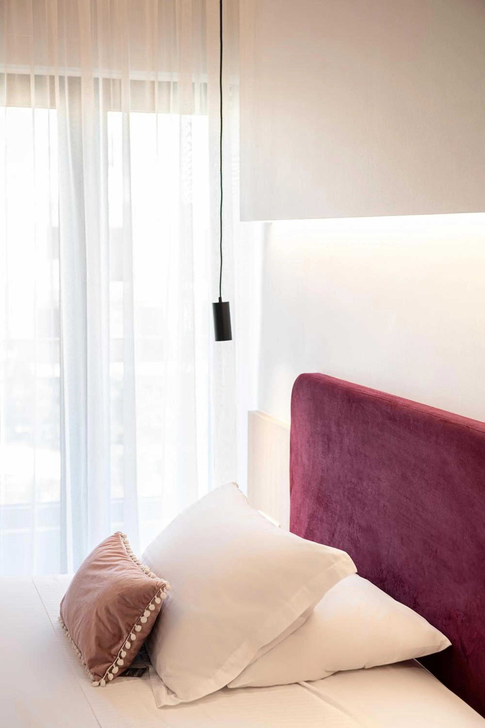 Bed in Miss Marrone City Hotel