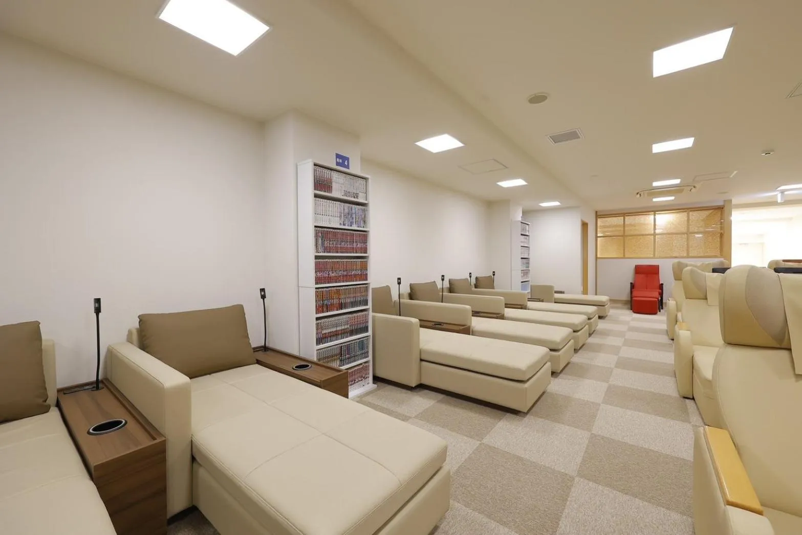 Communal lounge/ TV room in Sauna & Capsule Hotel Rumor Plaza