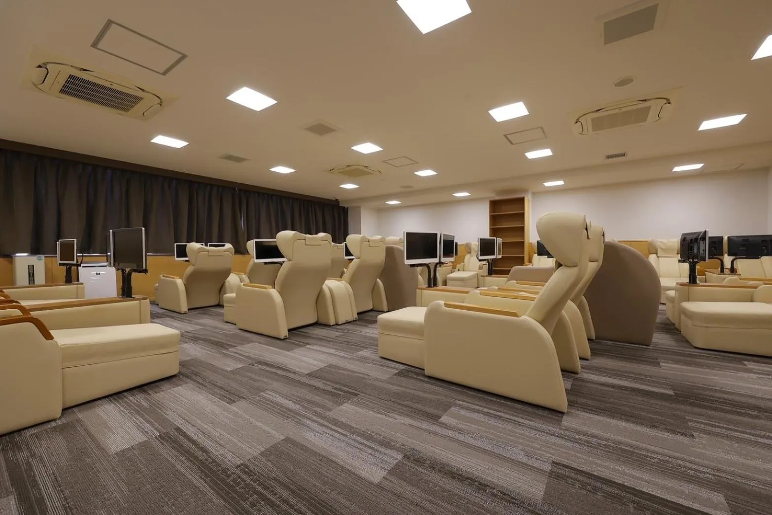 Communal lounge/ TV room in Sauna & Capsule Hotel Rumor Plaza