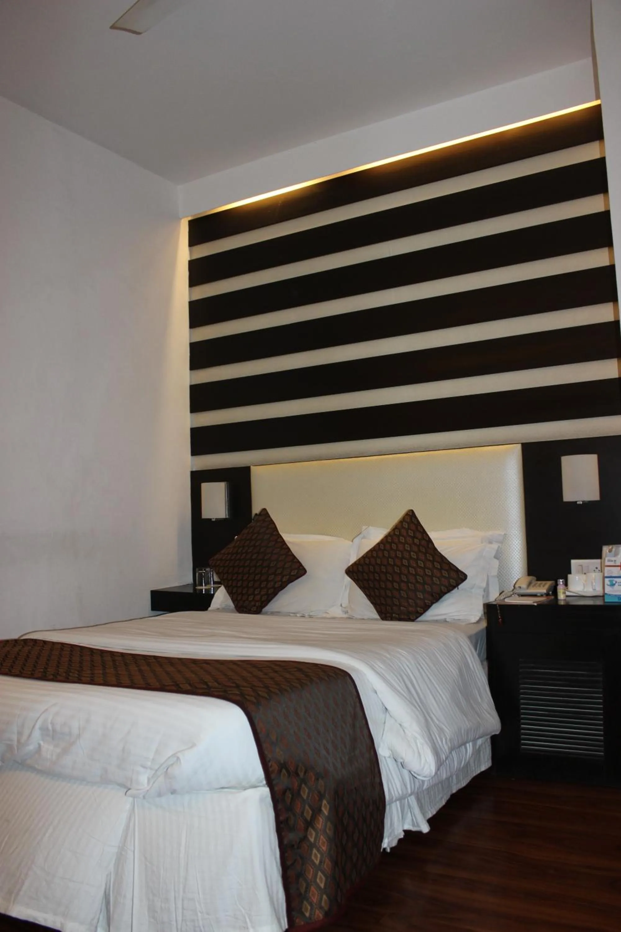 Bed in Hotel Jukaso Inn Down Town