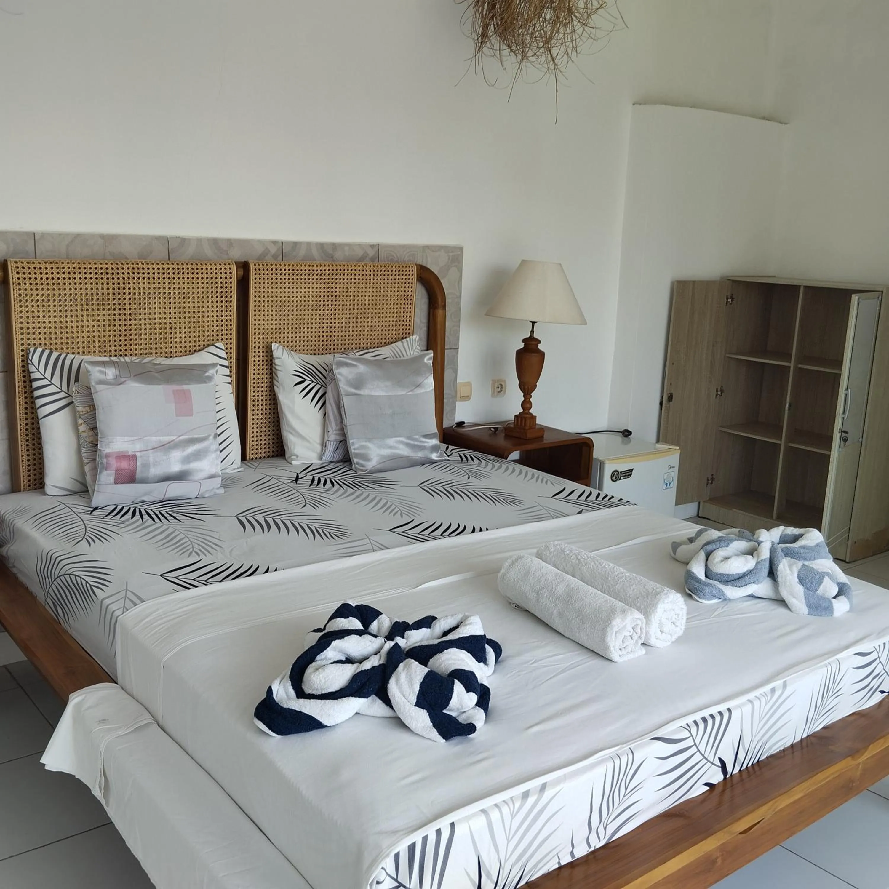 Bed in Palm Trees Villas