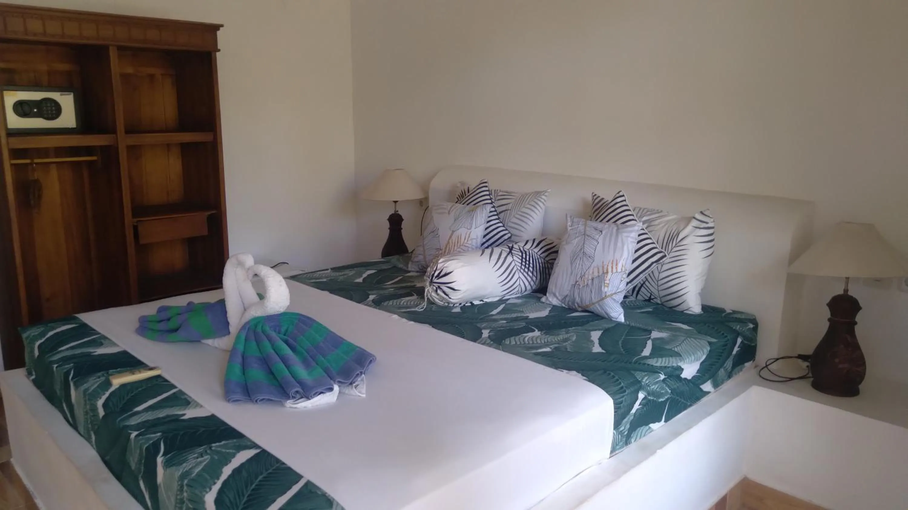 Bed in Palm Trees Villas