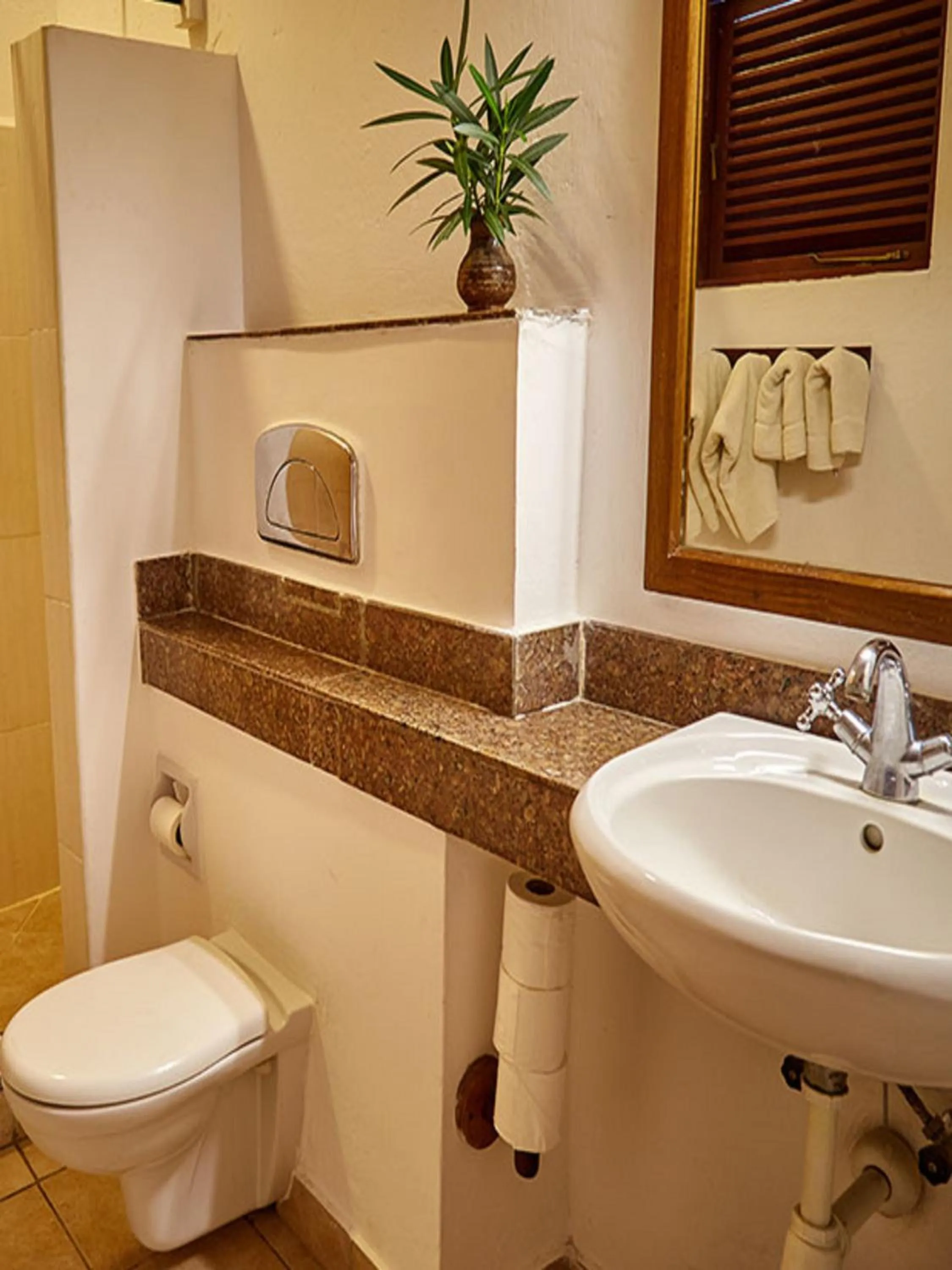 Bathroom in Pinewood Beach Resort and Spa