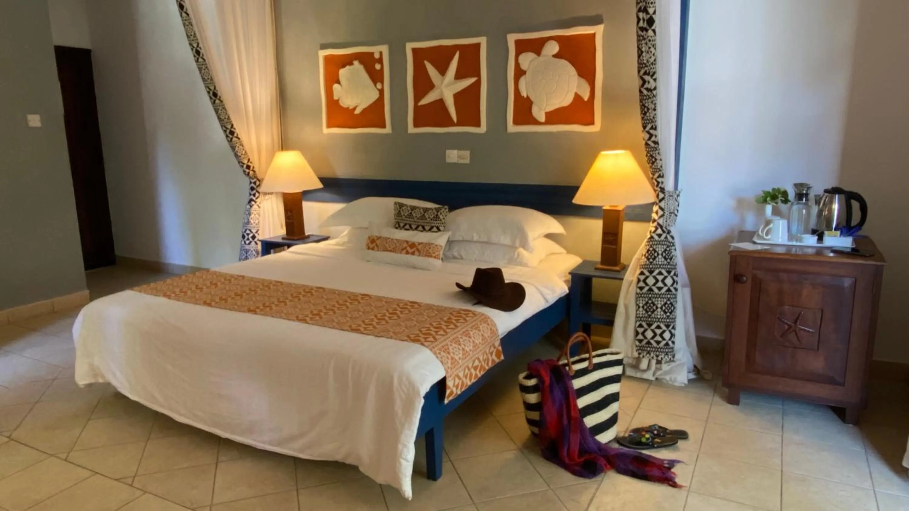 Bed in Pinewood Beach Resort and Spa