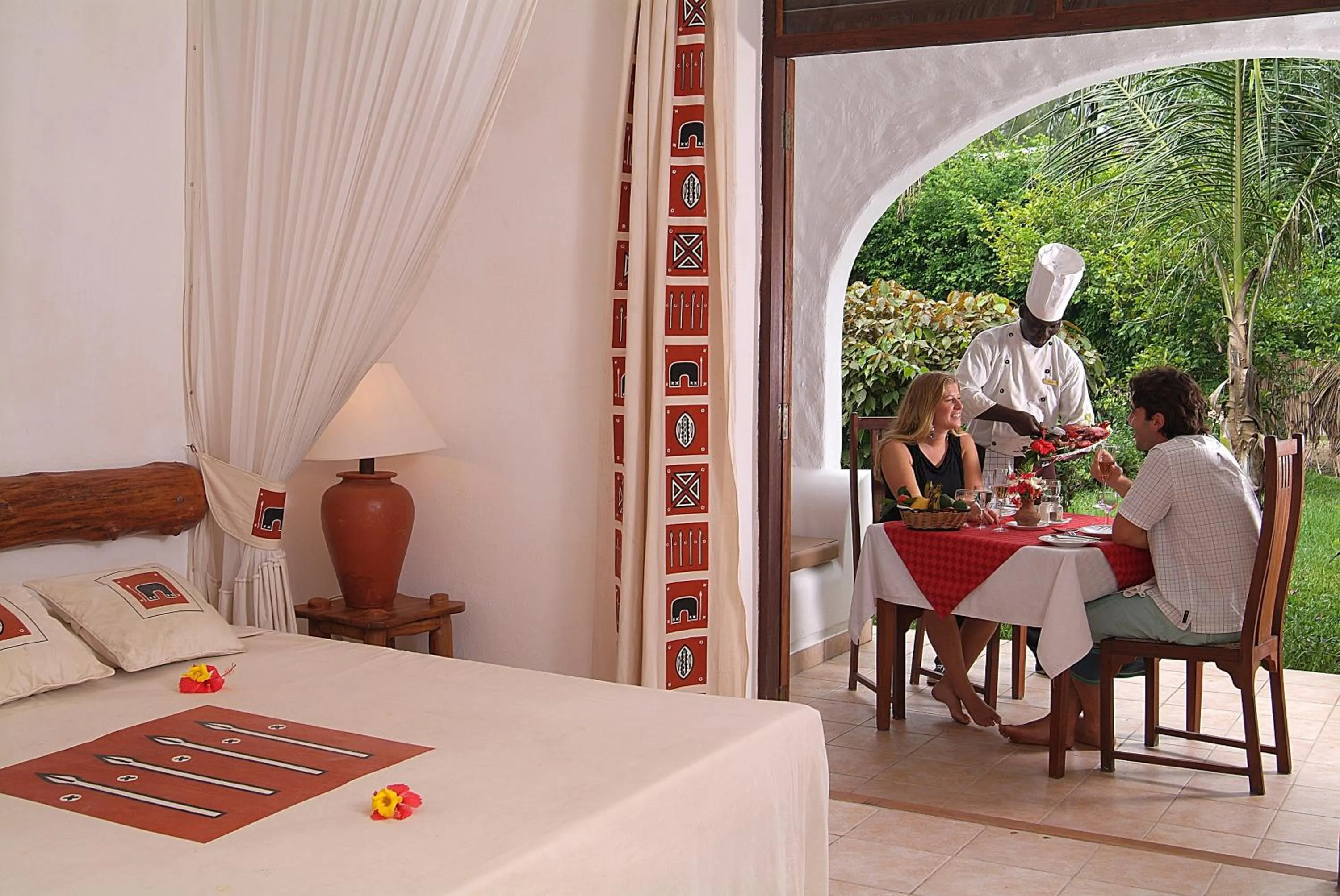 Bed in Pinewood Beach Resort and Spa