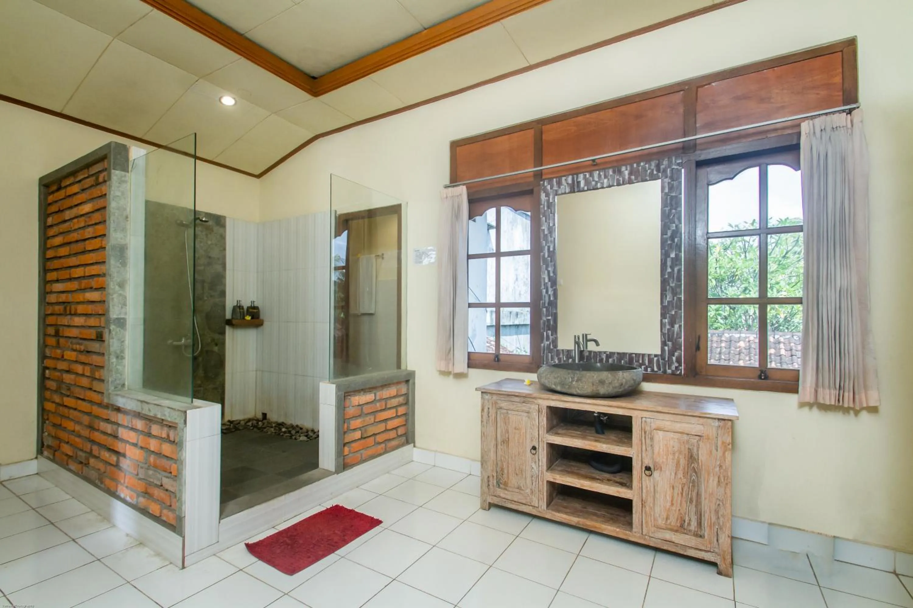 Bathroom in KUDESA Homestay by Pramana Villas