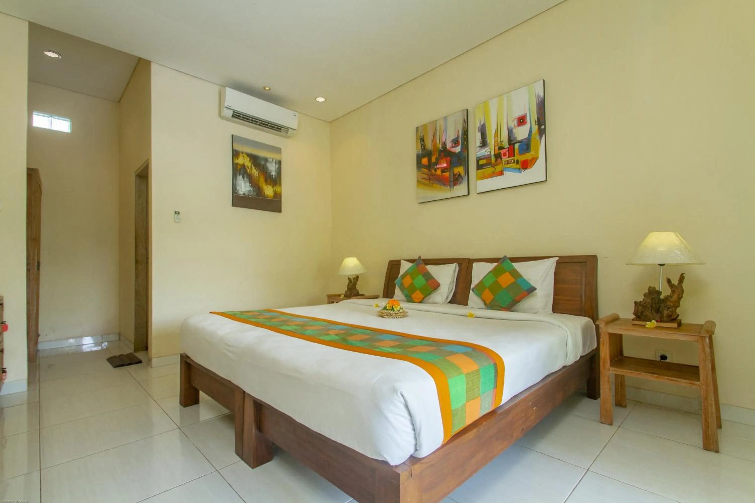 Bed in KUDESA Homestay by Pramana Villas