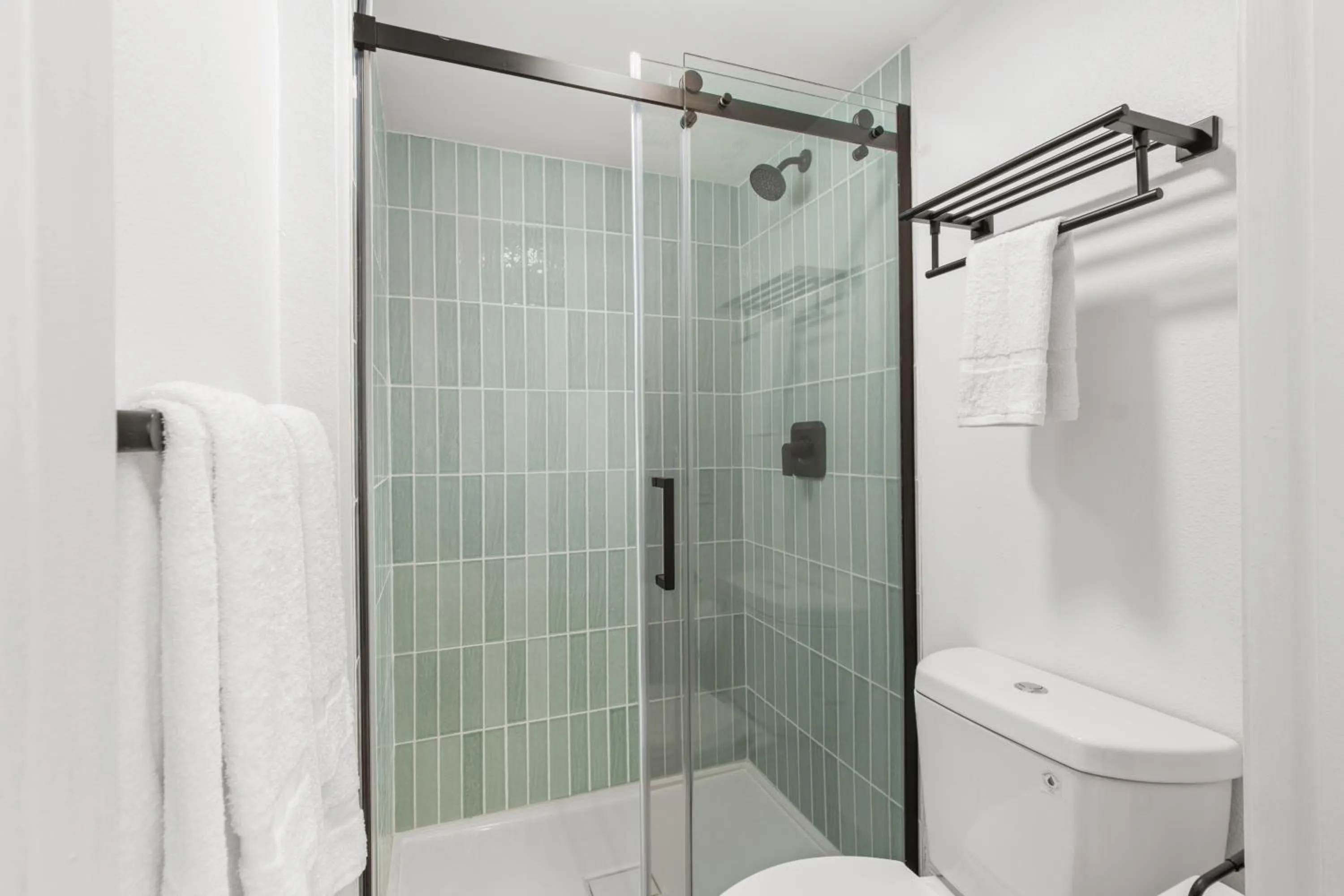 Shower in Uptown Inn - Limited Service Apart-Hotel