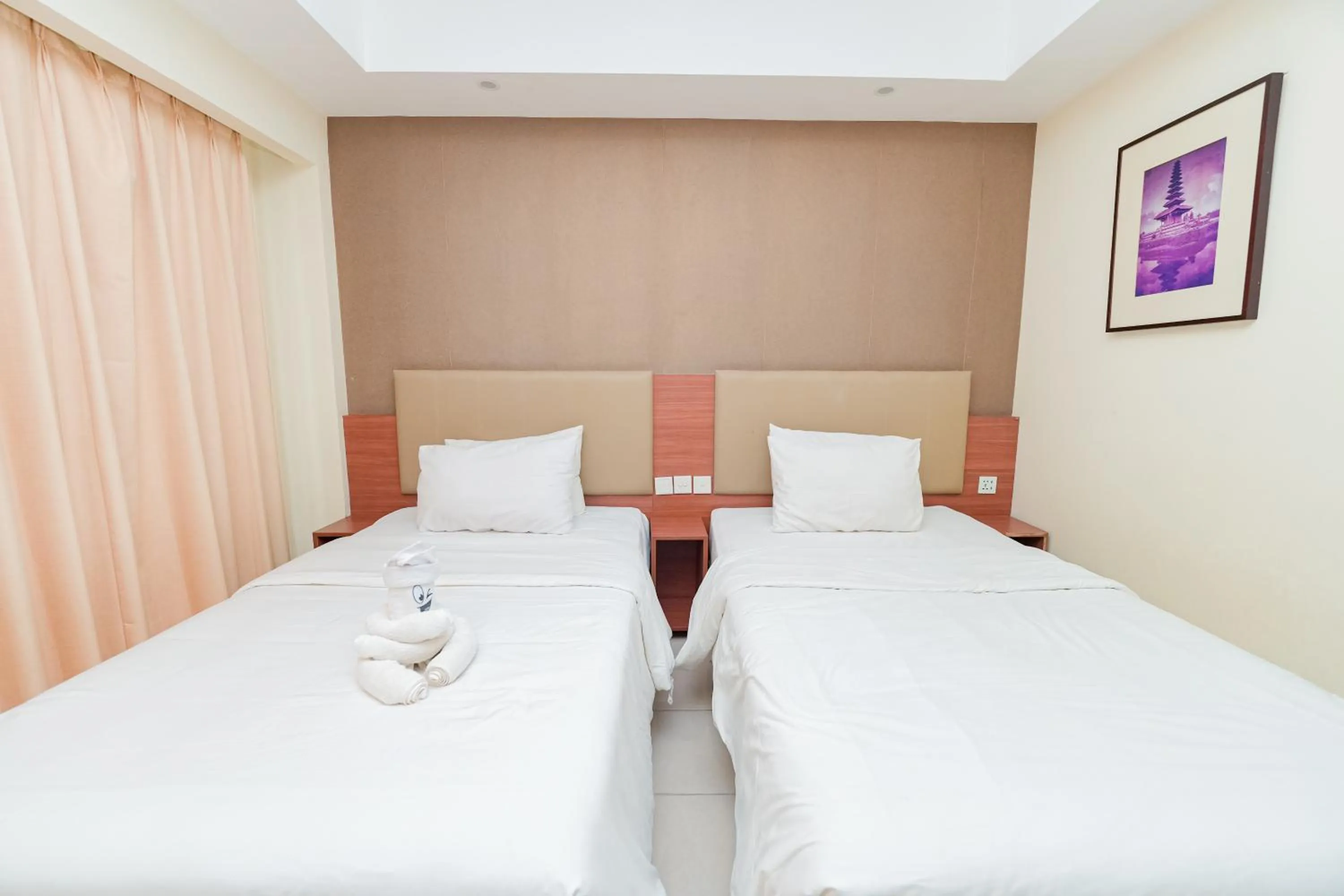 Bed in New Kuta Hotel by LORIN
