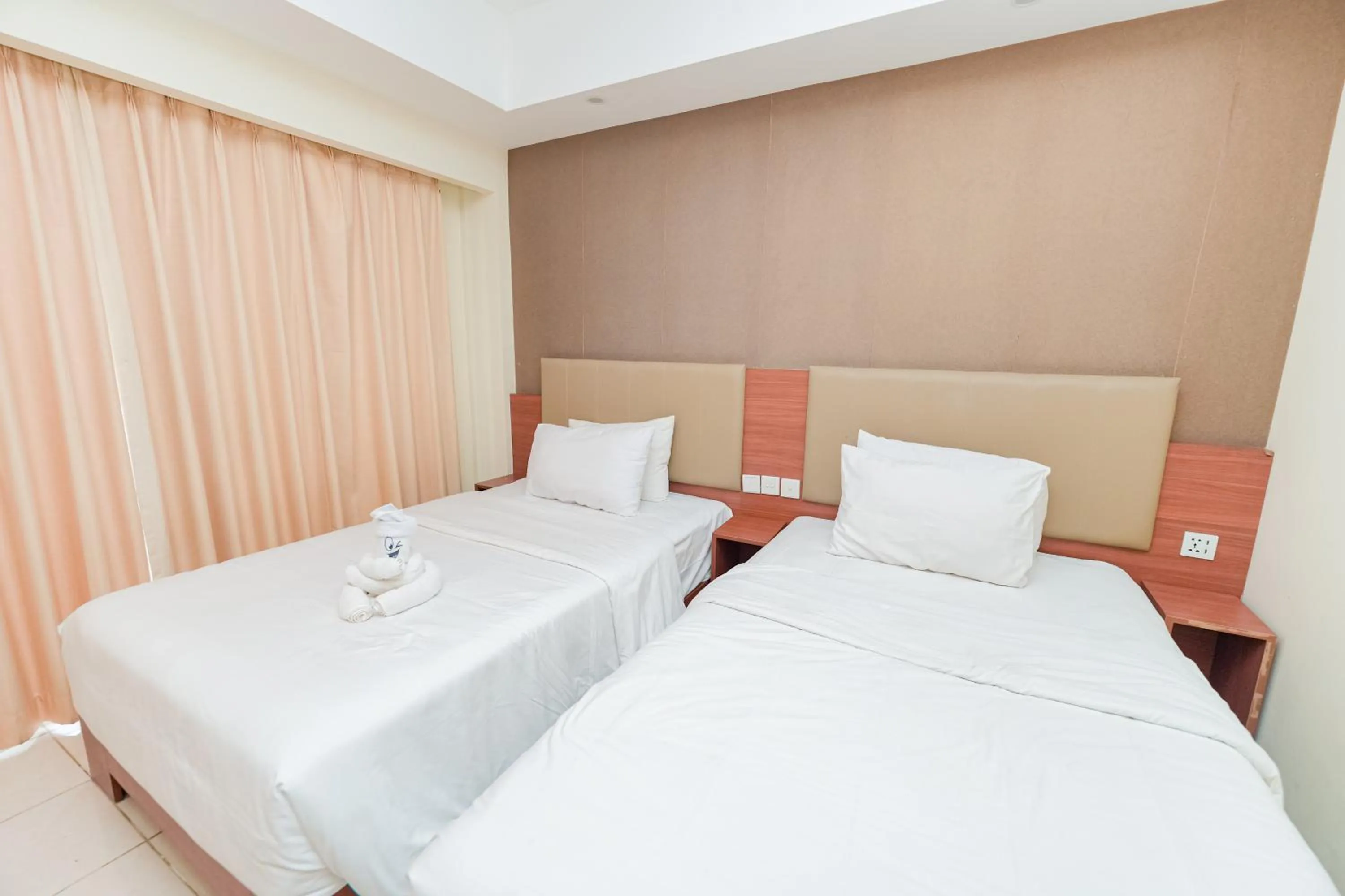 Bed in New Kuta Hotel by LORIN