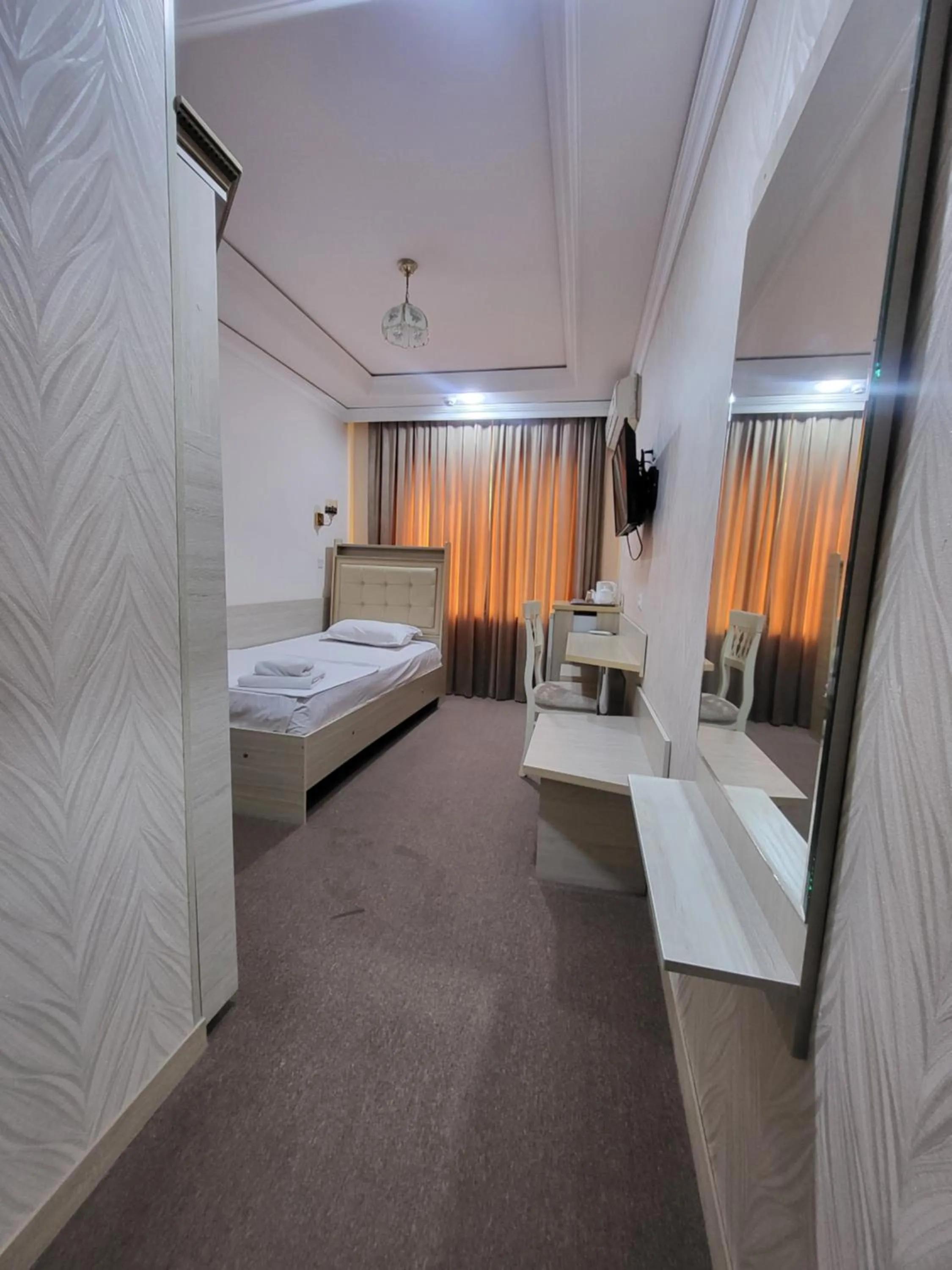 Bed in URGANCH Hotel