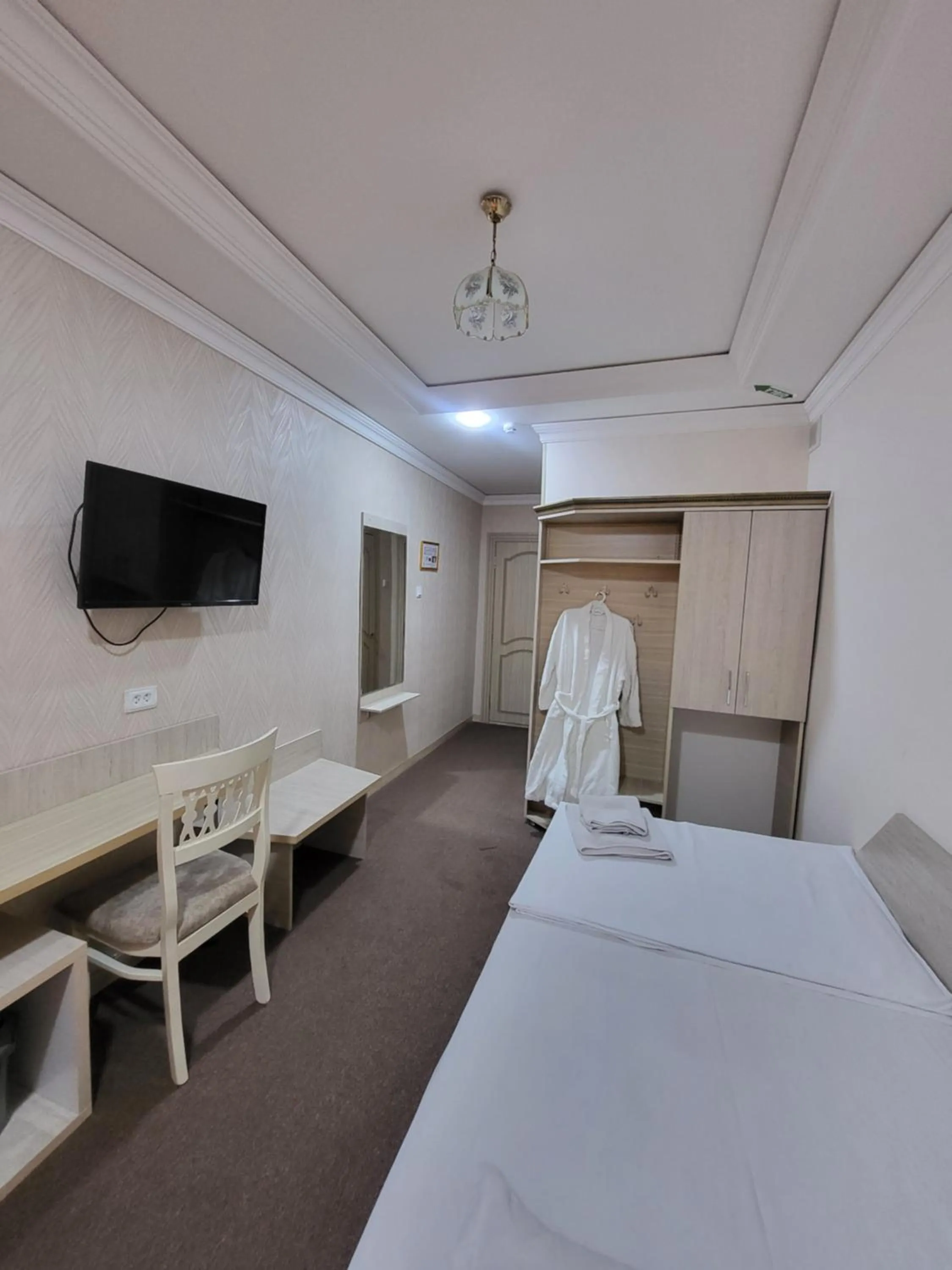 Bed in URGANCH Hotel