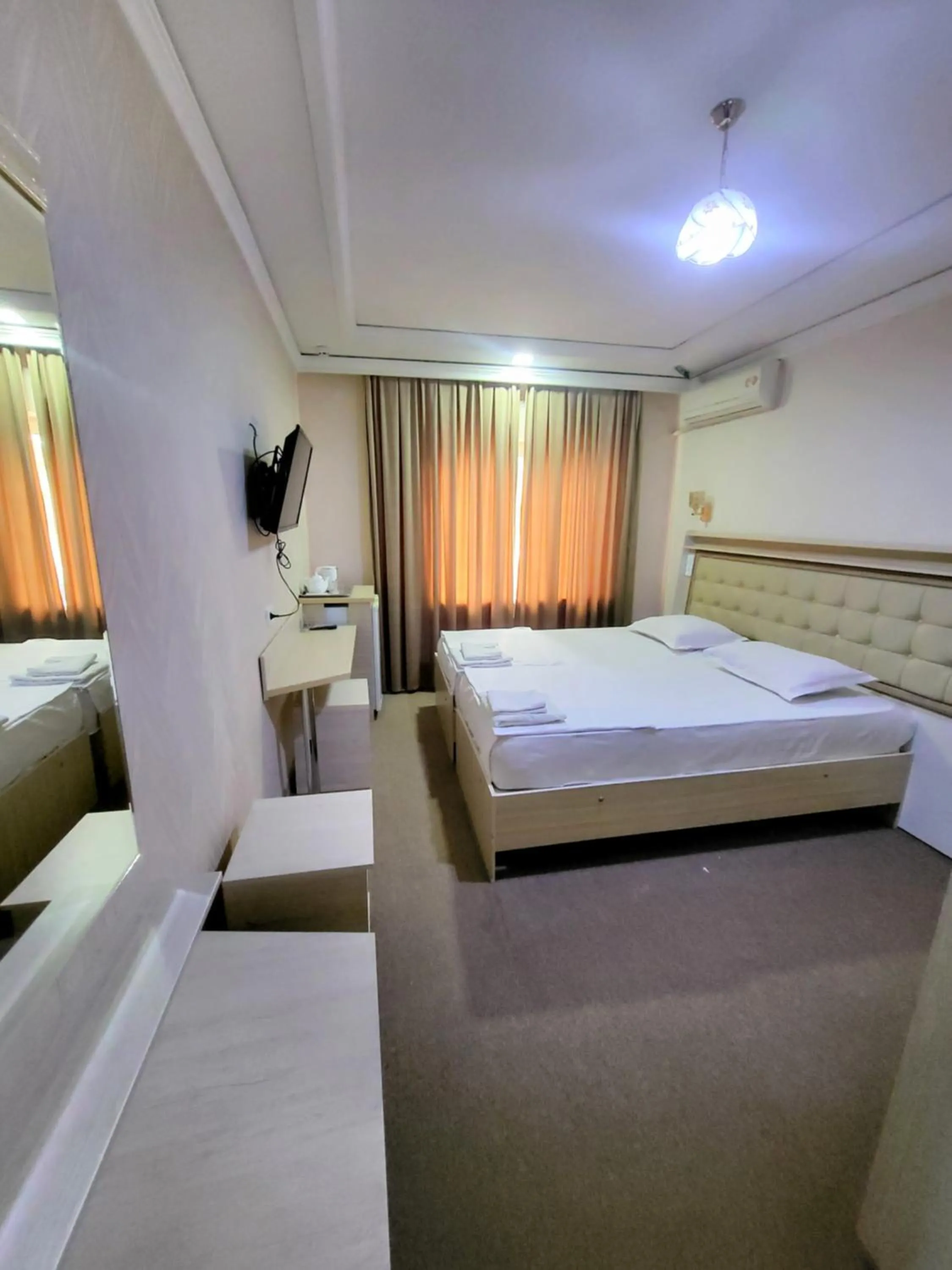 Bed in URGANCH Hotel