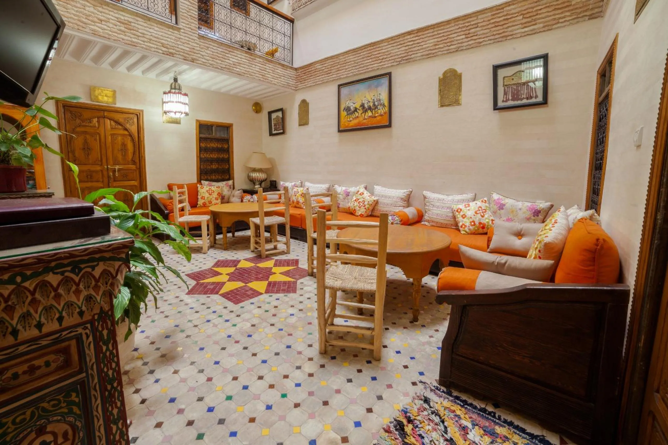 Communal lounge/ TV room in Riad Ikalimo 1