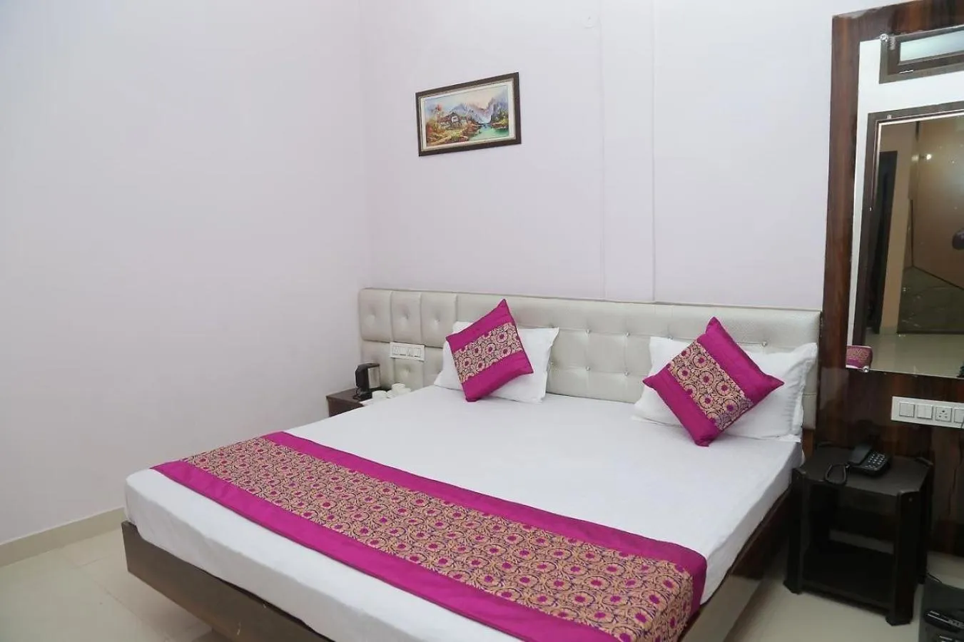 Bed in HOTEL GOLDEN DREAMS