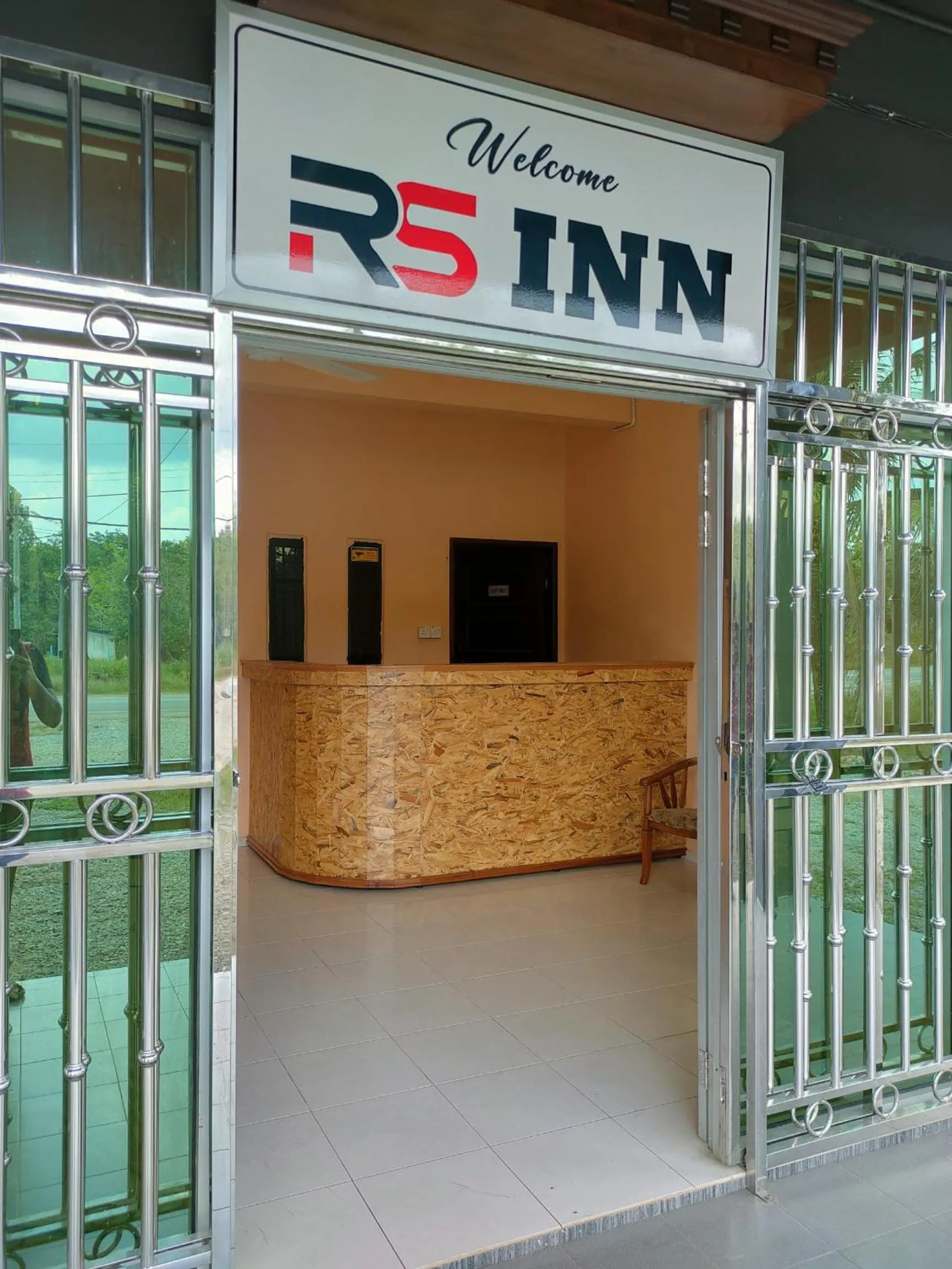 Property logo or sign in RS INN