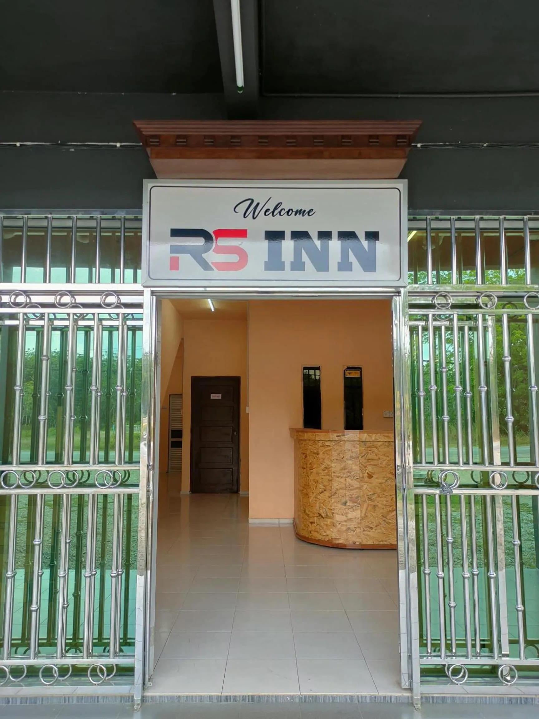 Property logo or sign in RS INN