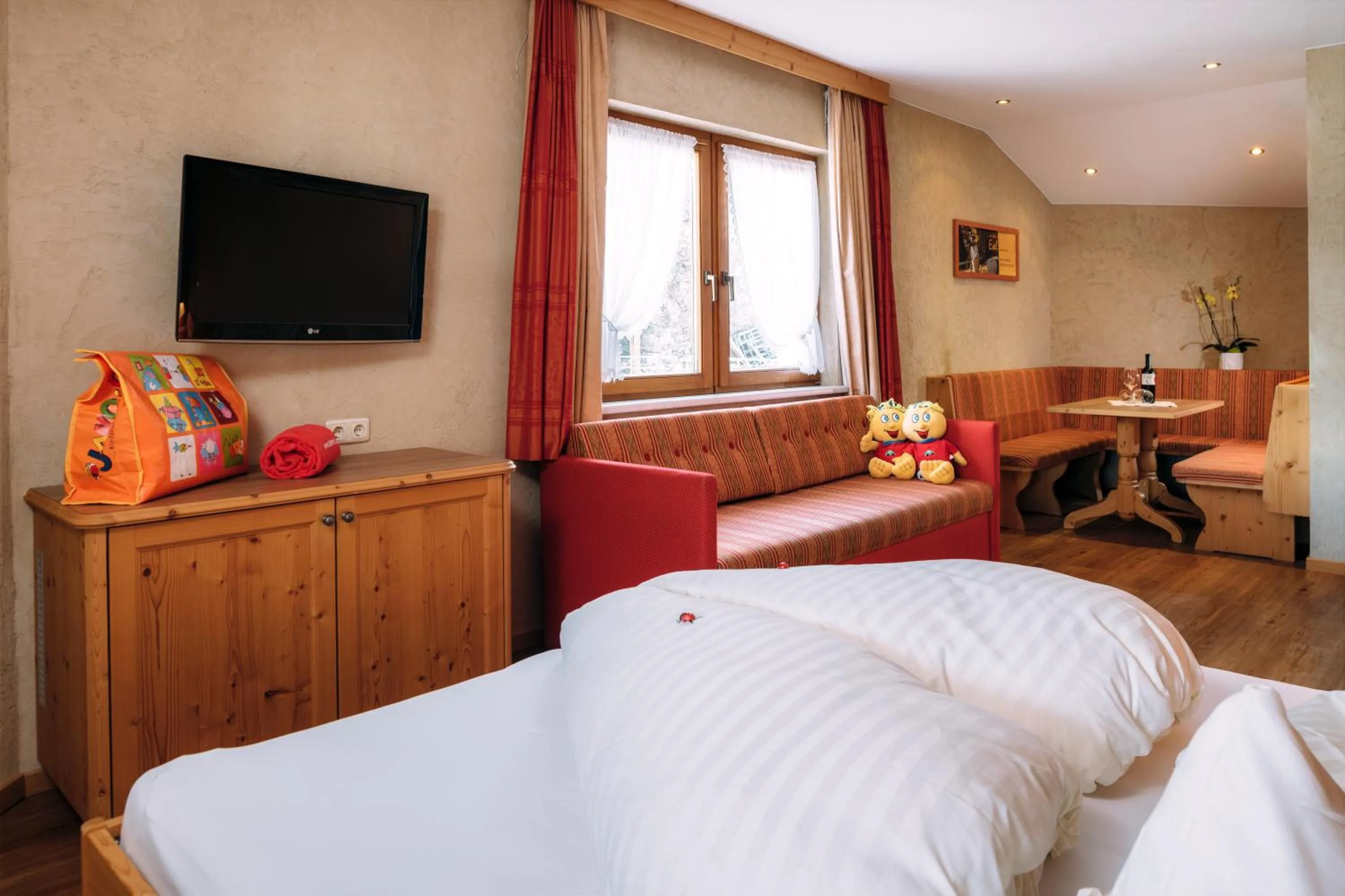 Photo of the whole room, Bed in Kinderhotel Laderhof