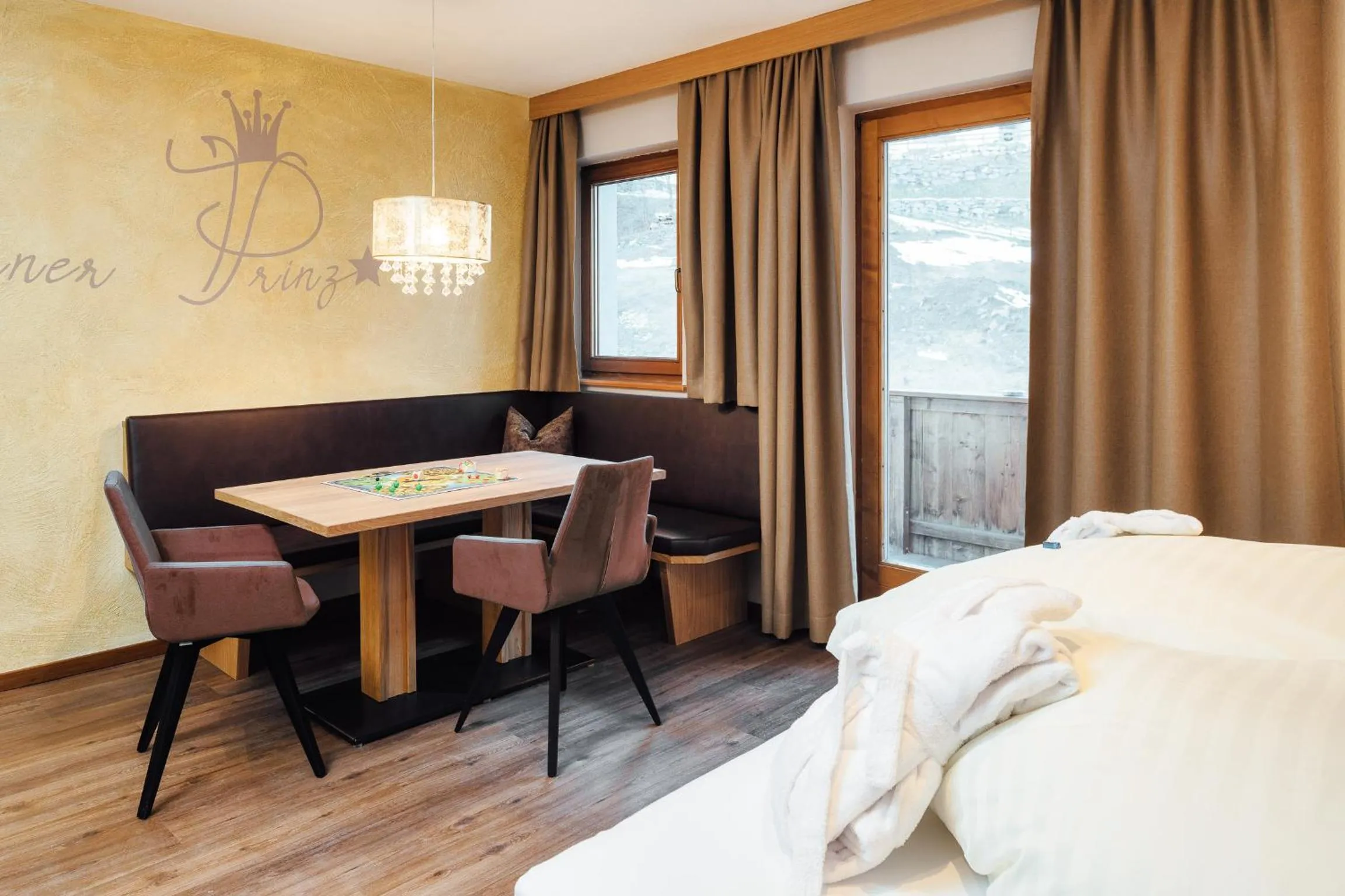 Seating area, Bed in Kinderhotel Laderhof