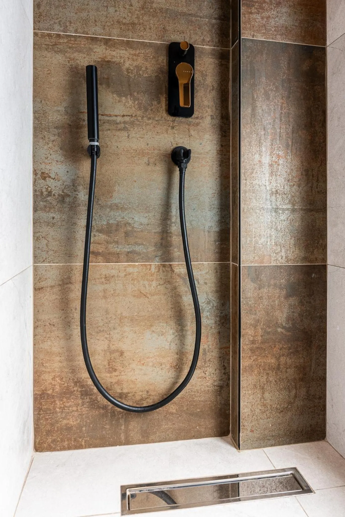 Shower in La Rêve Luxury Apartments with Private Jacuzzi