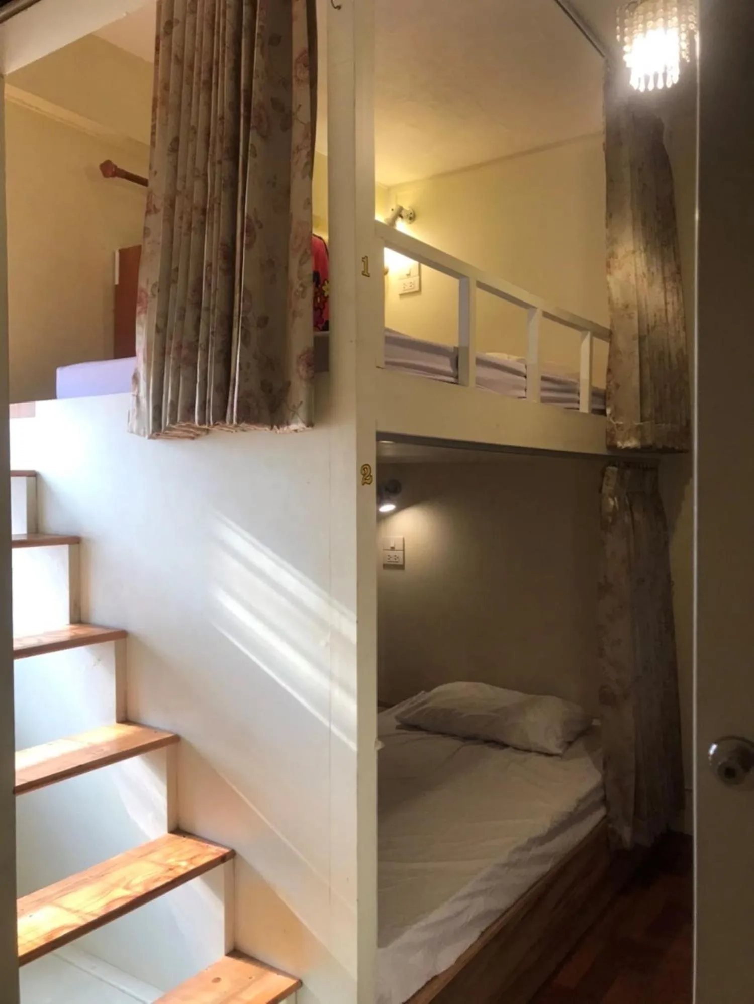 Bed in Chiangmai Gate Capsule Hostel