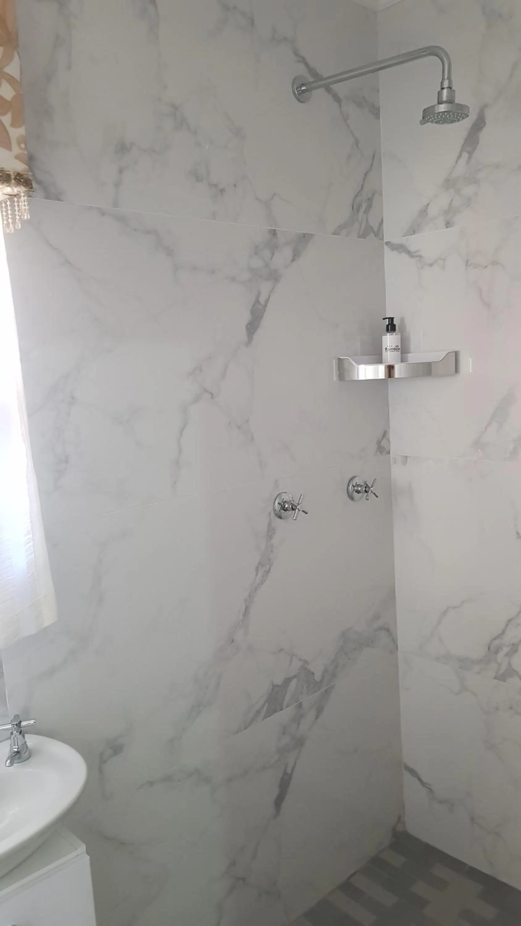 Shower in Rainbow Guest House and Tours