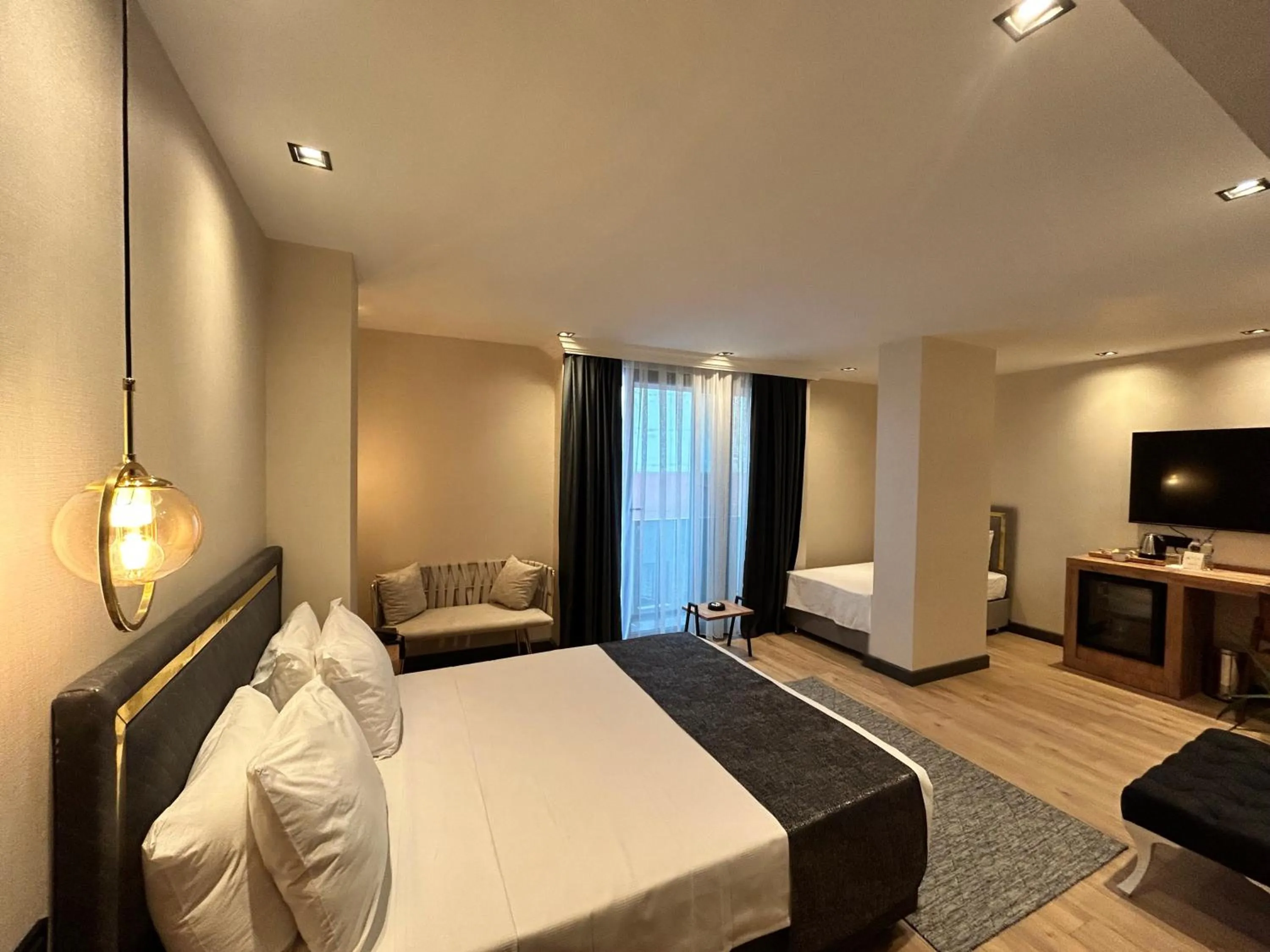 Bed in AYATOURE HOTEL