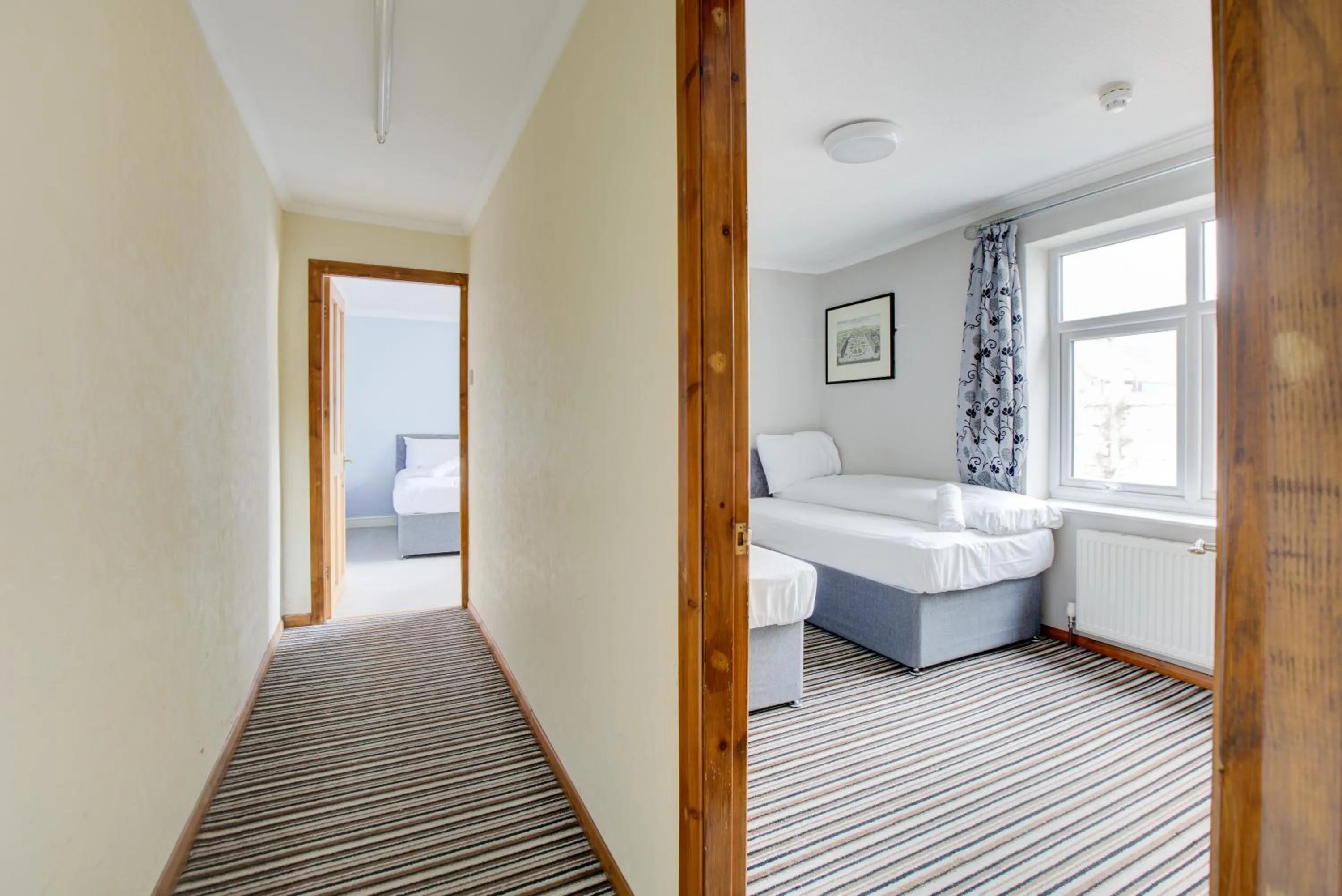 Bedroom, Bed in The Sandringham Court Hotel & Apartment Welcoming Large and Small Groups for 16 years