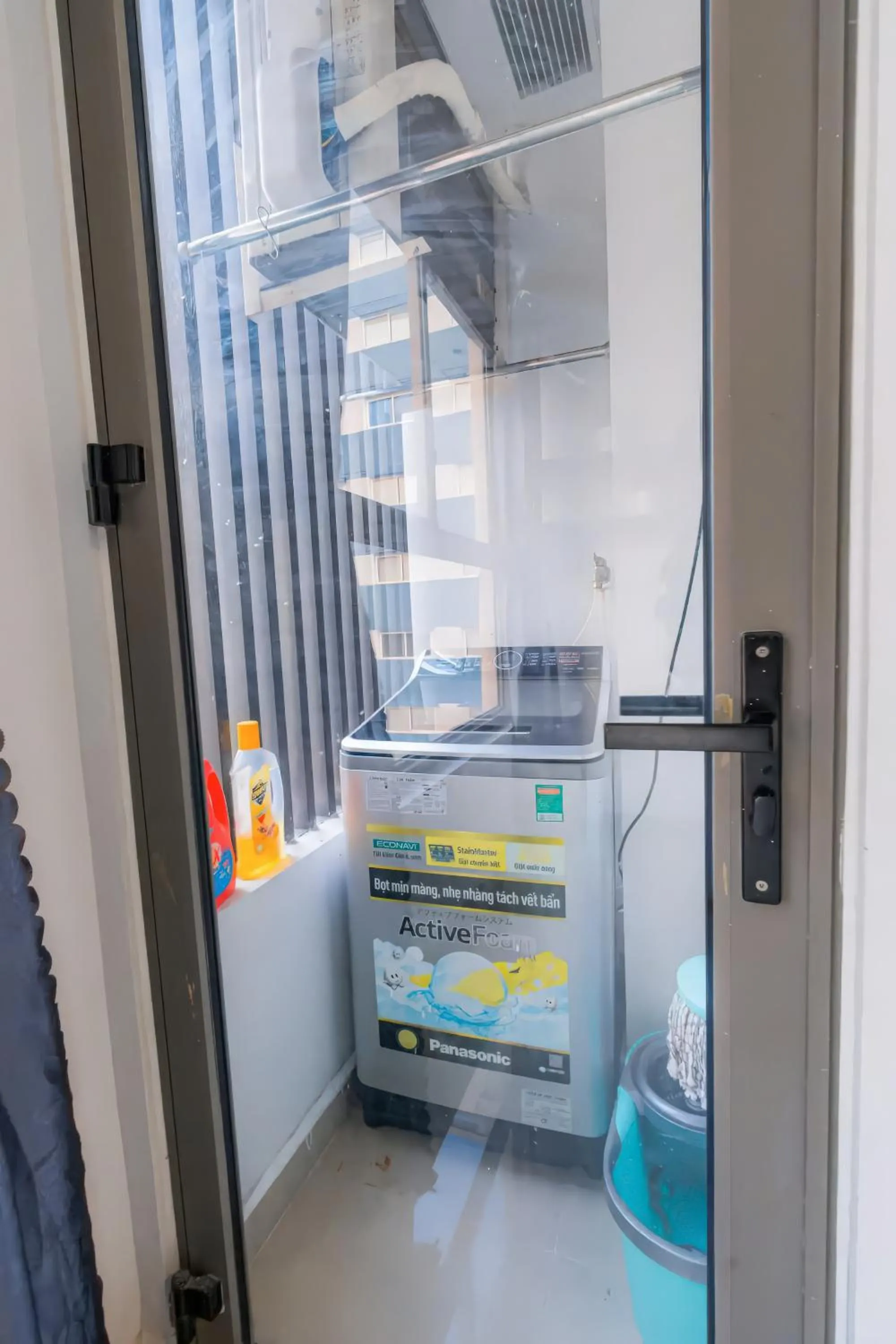 washing machine in Minute Suites - Botanica Orchard TSN Airport