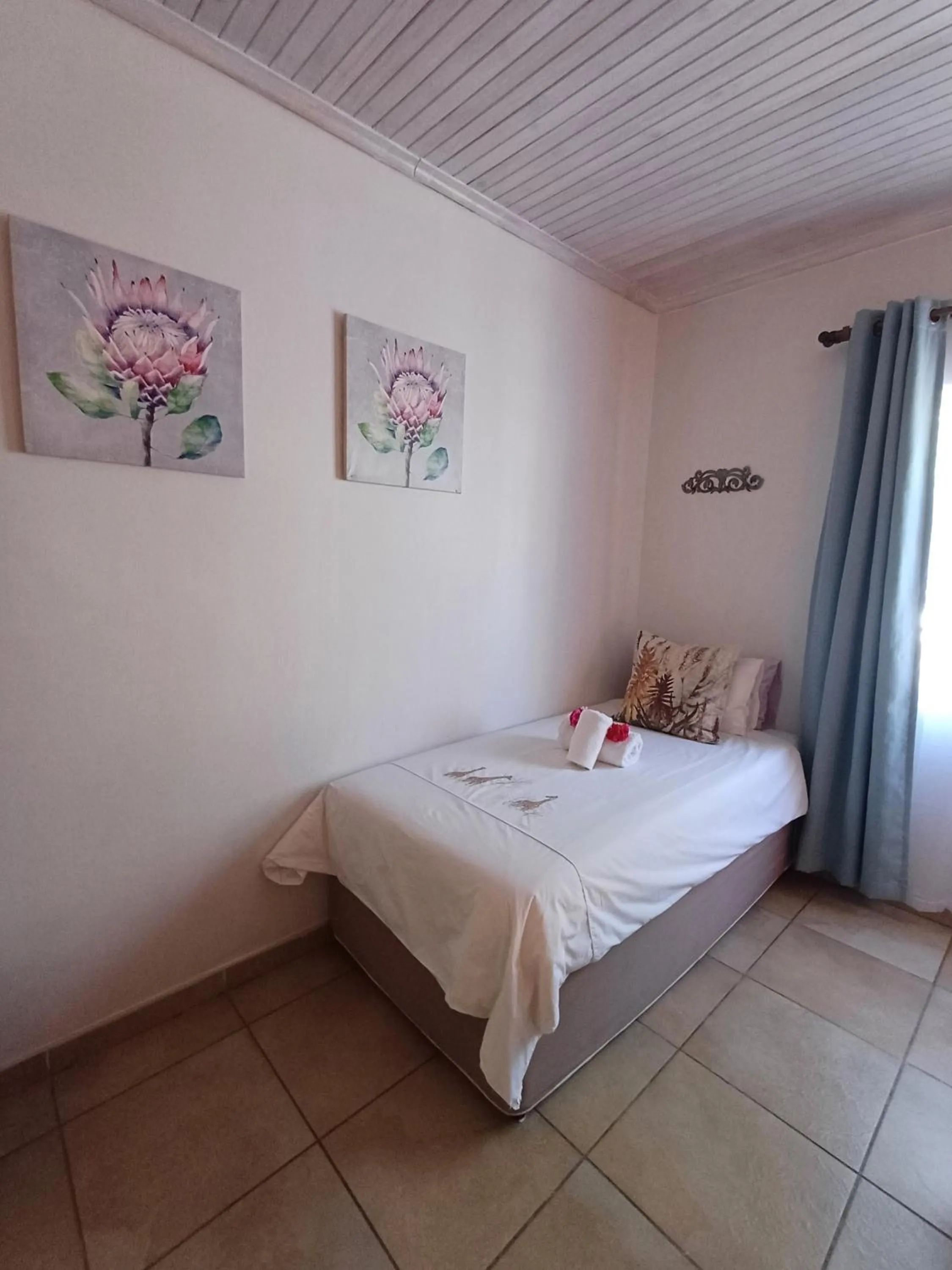 Bed in Capbon Guesthouse