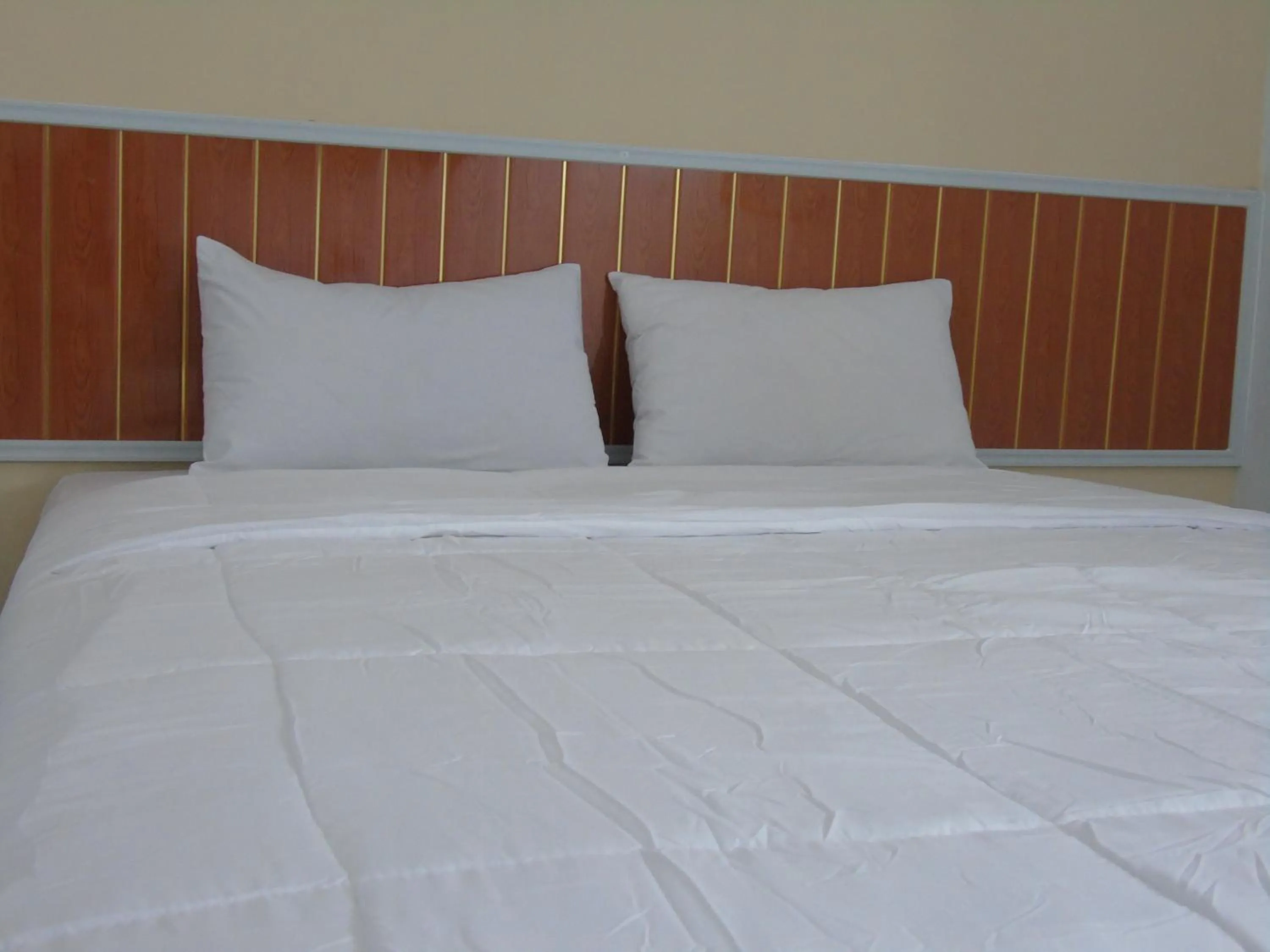 Bed in Hotel Permata Zamrud